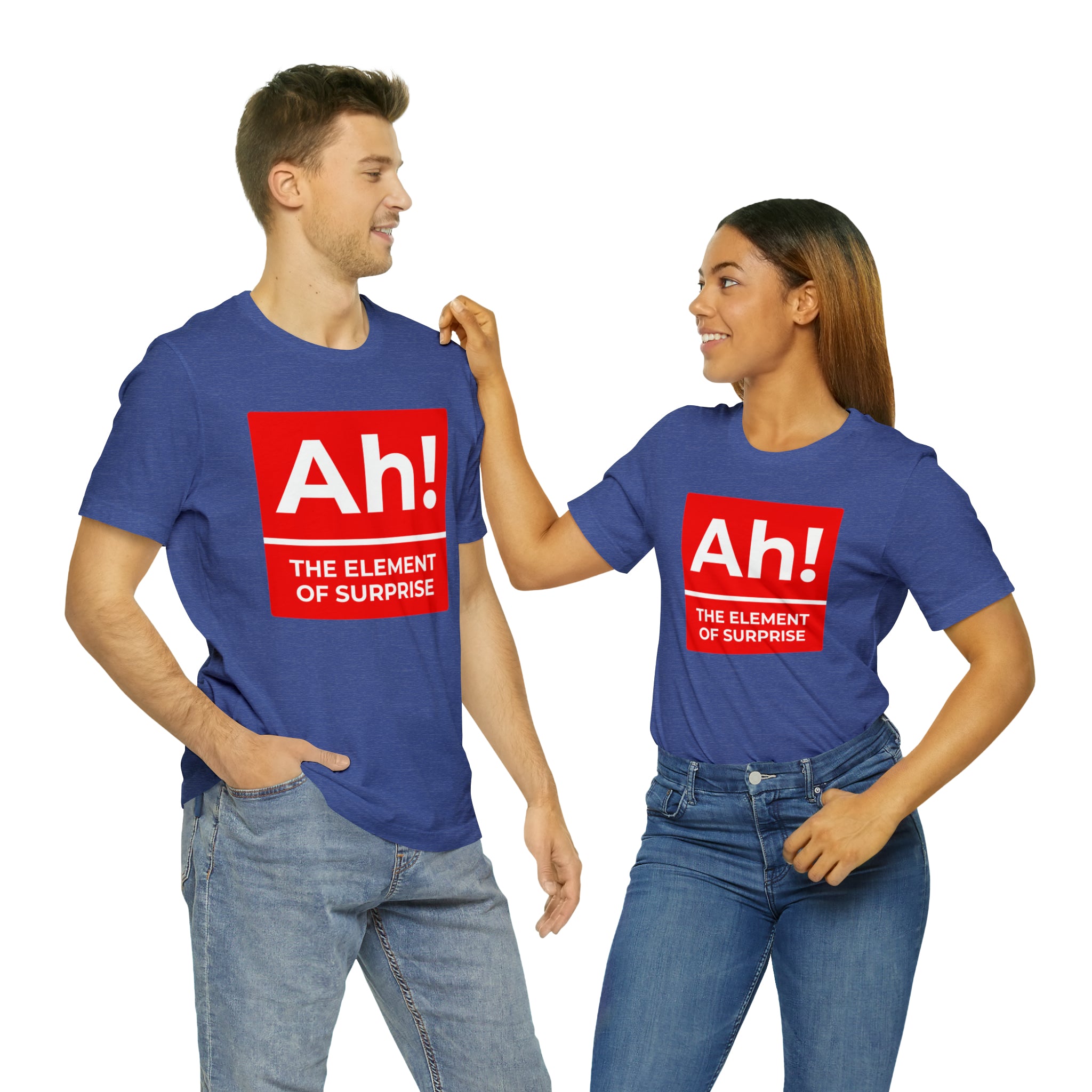 A man and woman standing next to each other wearing a t-shirt that says Ah! the Element of Surprise.