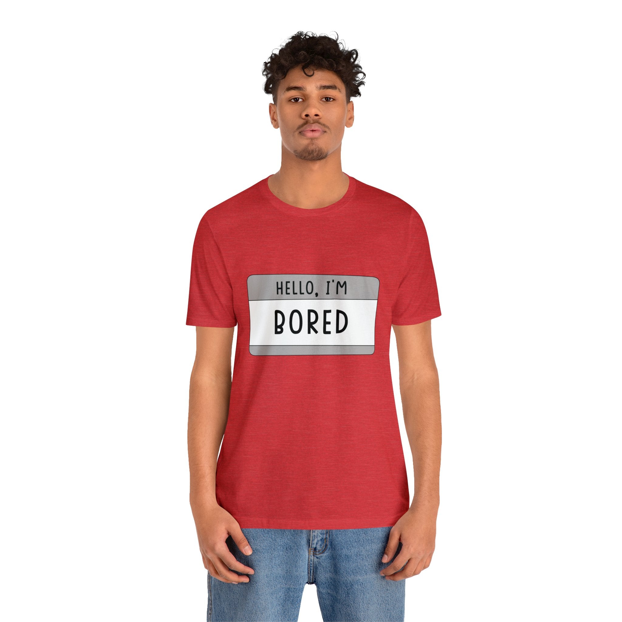Sentence with replaced product name: A man in a red Hello, I'm Board T-Shirt stands out in the crowd.
