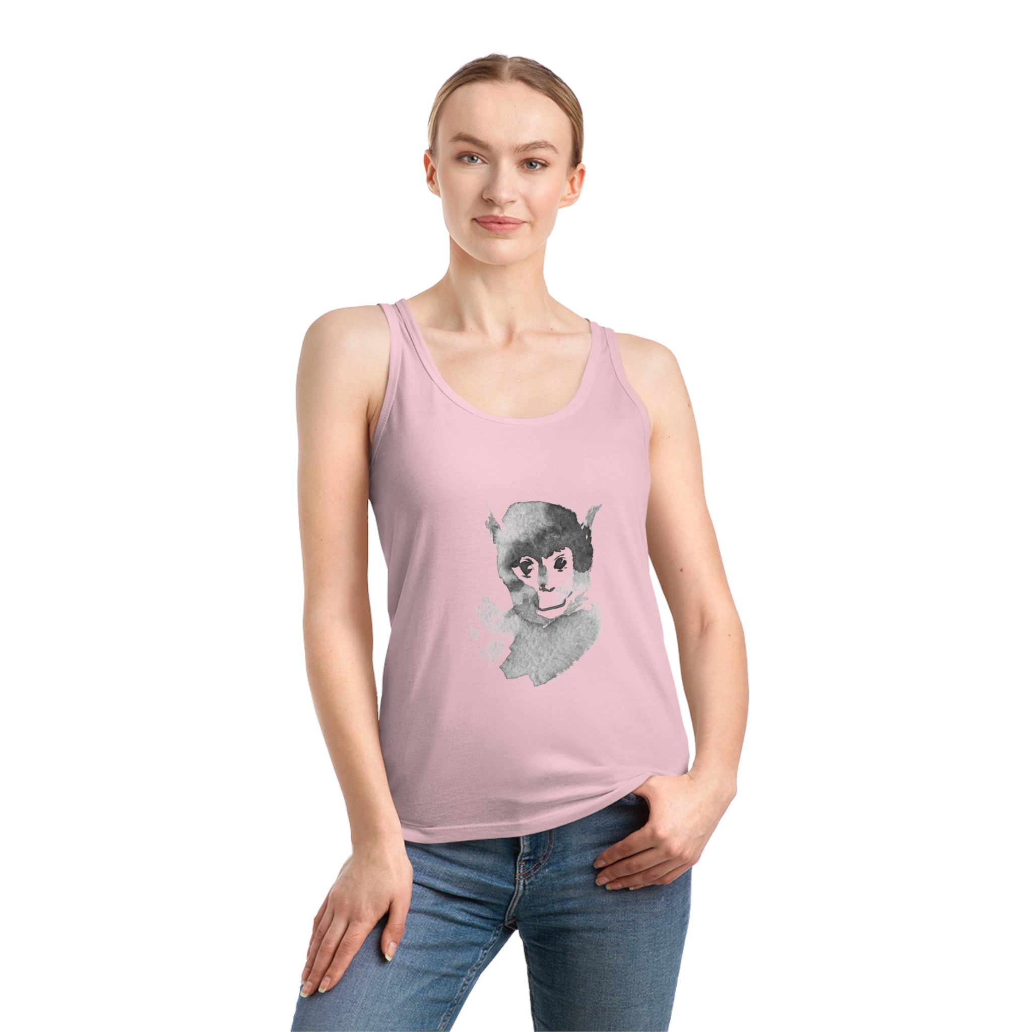 A person wearing the Monkey Women's Dreamer Tank Top, crafted from organic cotton and featuring a stylish pink face graphic, stands against a plain backdrop with their hands by their sides.