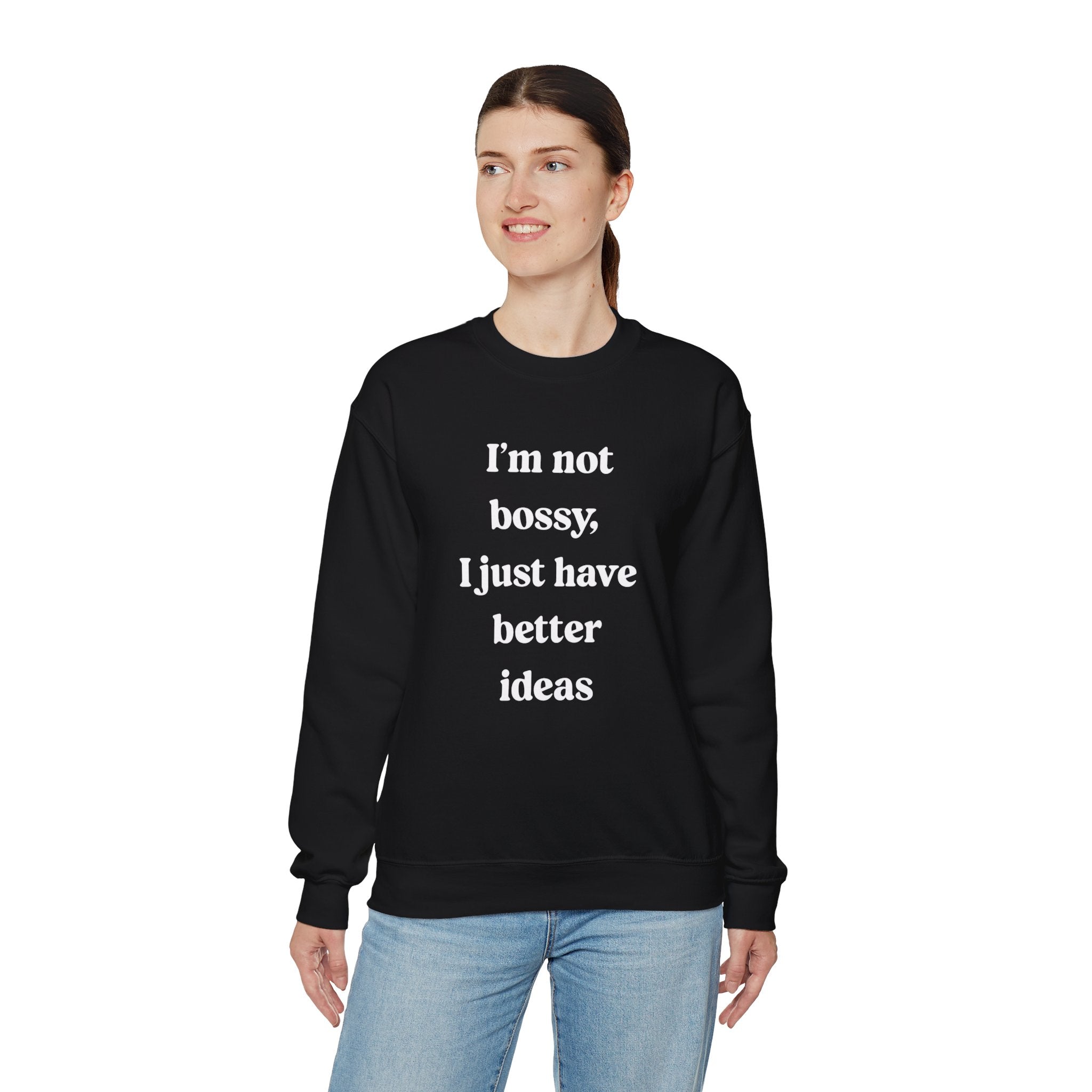 Wearing the "I'm Not Bossy I Just Have Better Ideas" sweatshirt, a person stands against a white background, enjoying its warmth for the colder months.