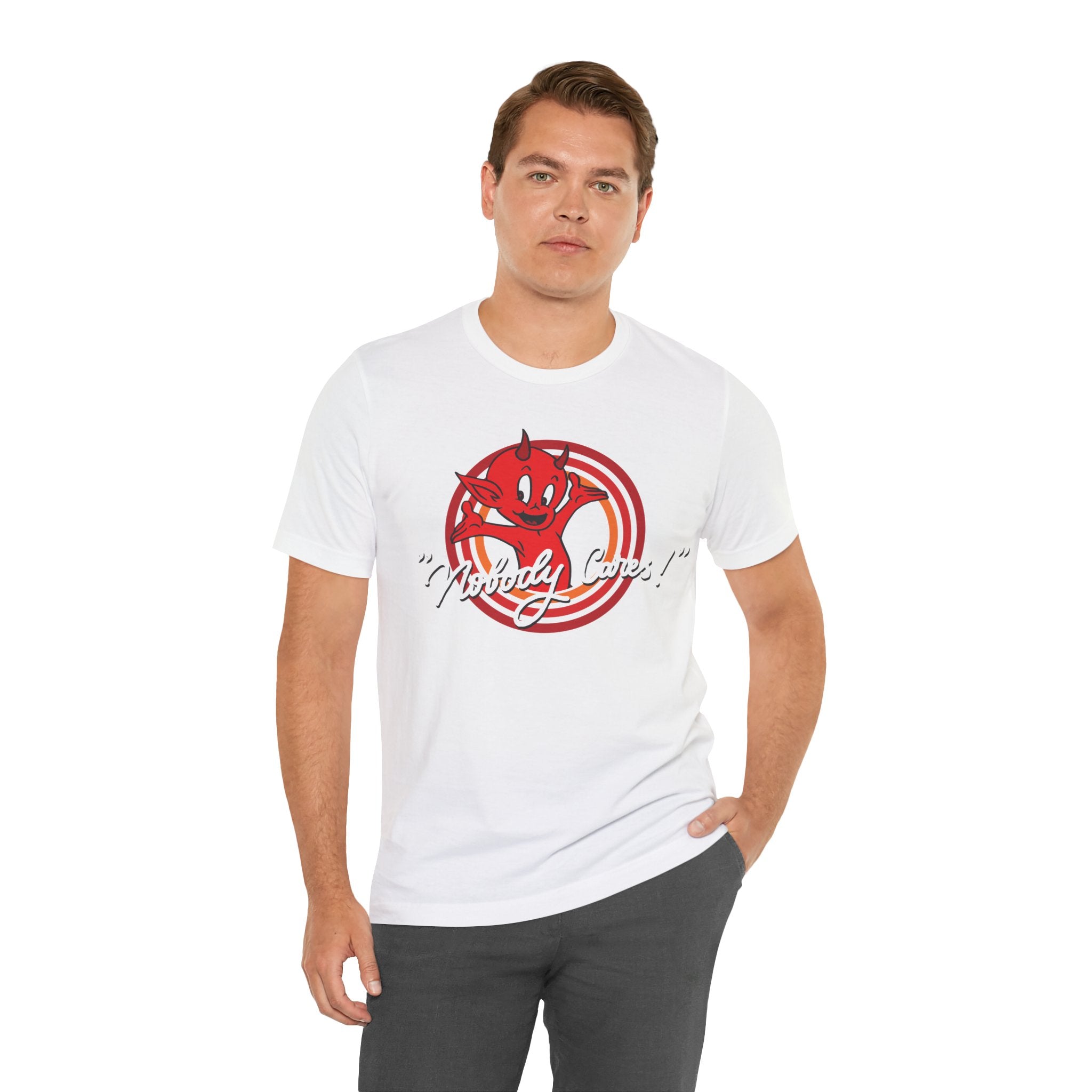 Man in a Nobody Cares jersey tee with a red dragon design and the text "mythical games" standing against a white background.