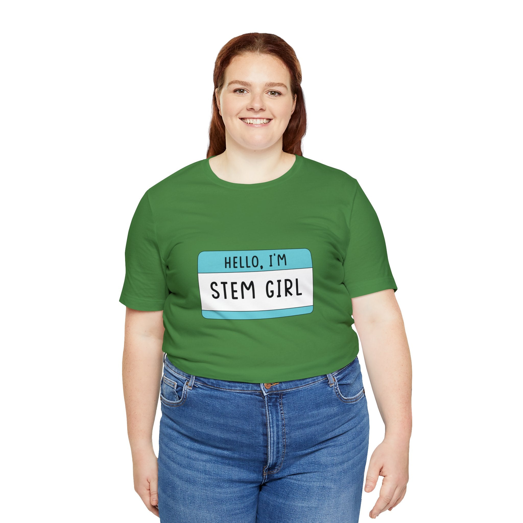 A young woman in a Hello, I'm Stem Girl T-Shirt, smiling at the camera against a white background.