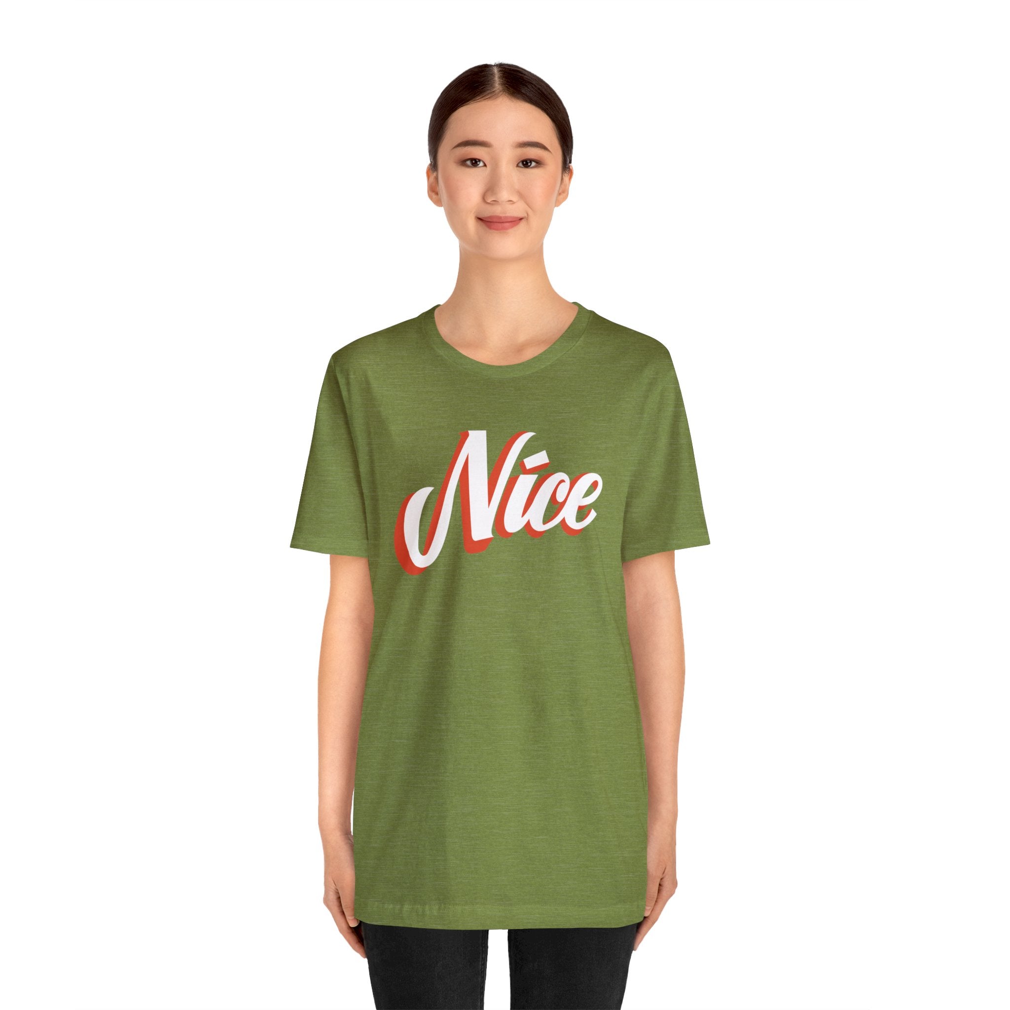 A woman wearing a green Nice T-Shirt, showcasing her geeky style.