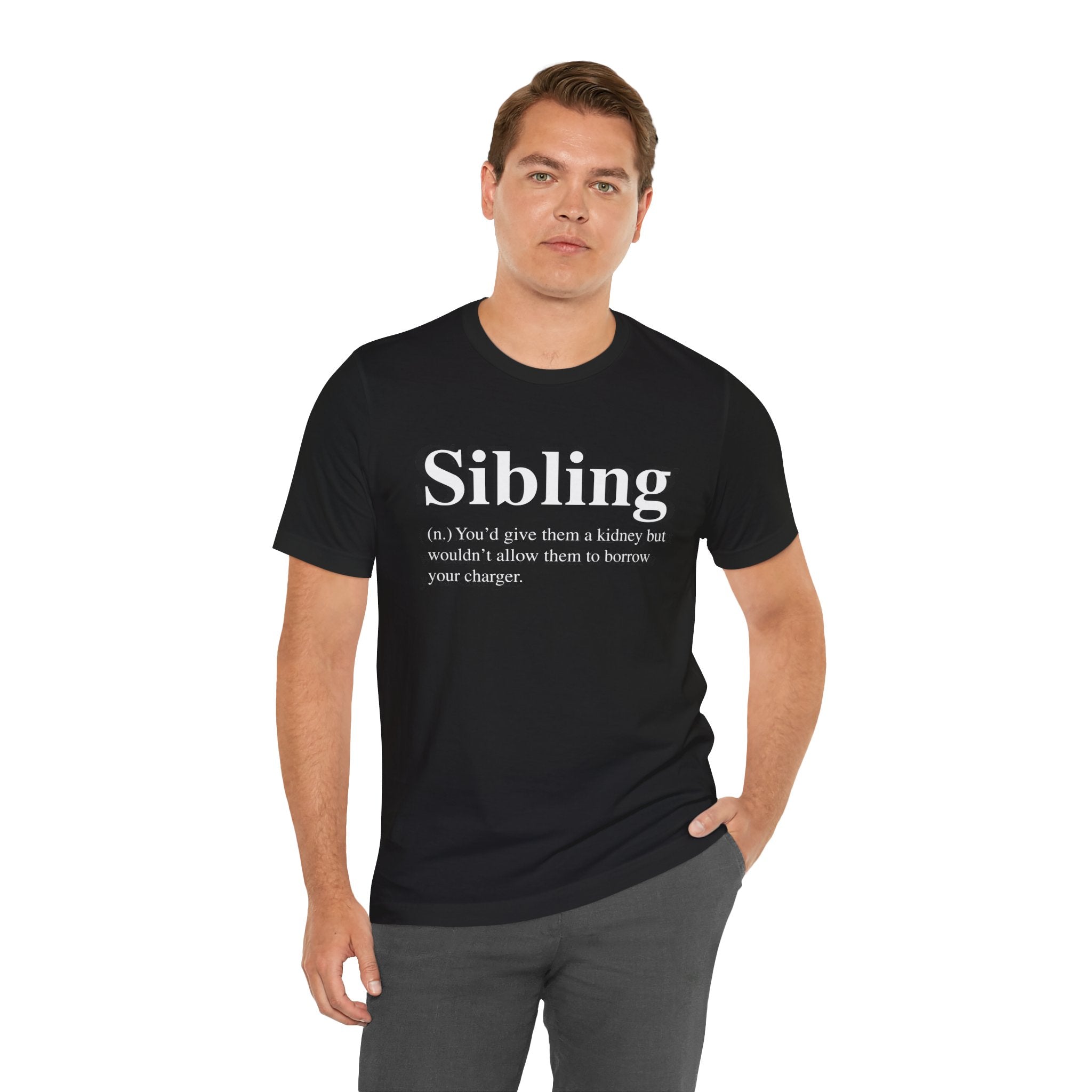Man wearing a Soft cotton Black Sibling T-Shirt with the text "siblings" and a humorous quote about sharing a kidney but not a charger.