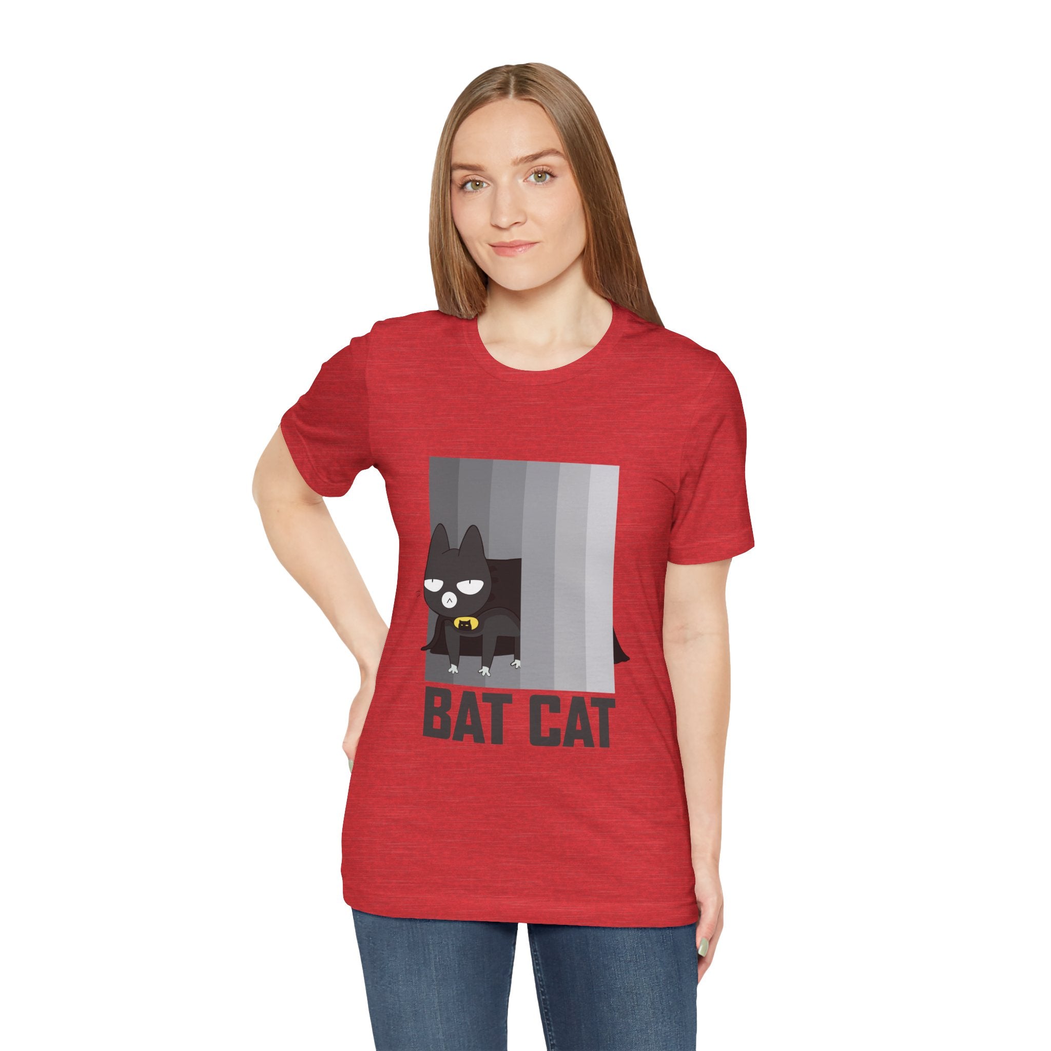 Woman in a red BATCAT T-Shirt with a graphic design.