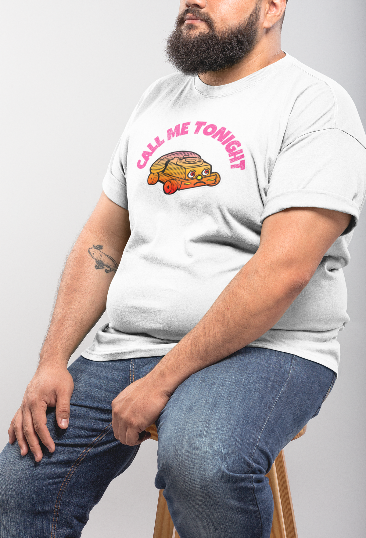 'Call Me Tonight' funny car t-shirt in white, bearded man sitting wearing it, quirky pun shirt gift