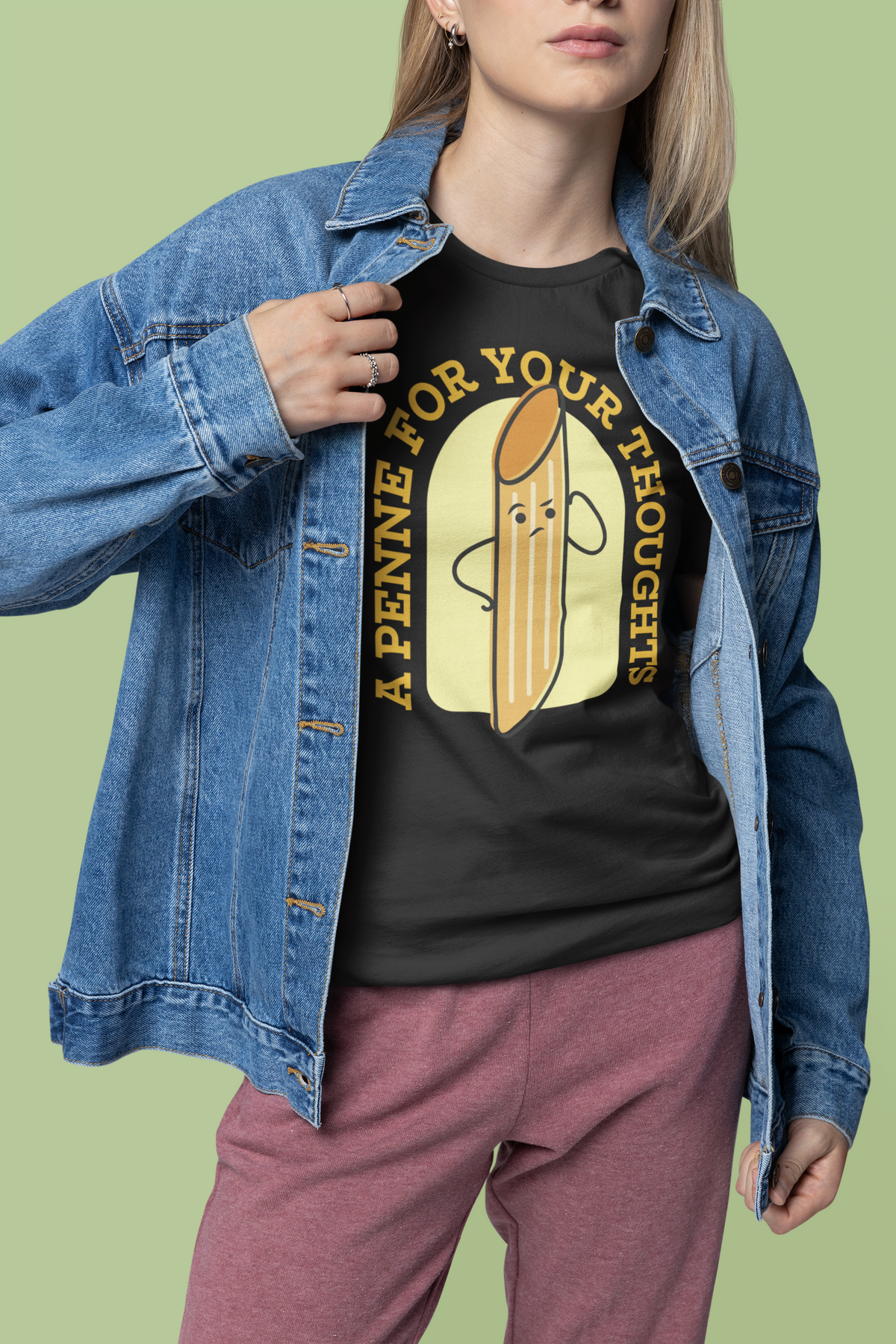 'A Penne For Your Thoughts' t-shirt in black, woman in denim jacket wearing it, funny foodie gift