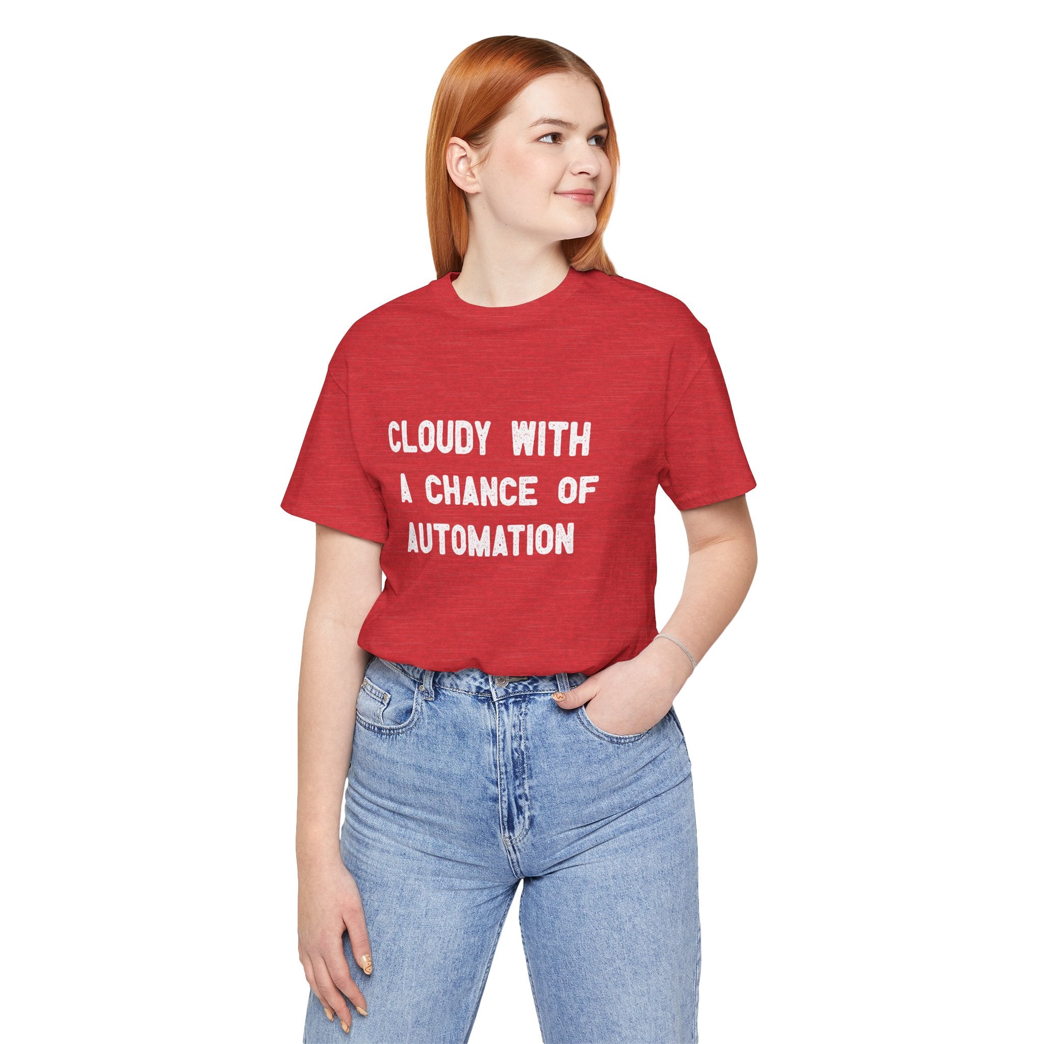 A person wearing a "Cloudy With a Chance of Automation" T-shirt made from red Airlume cotton and blue jeans, standing against a white background.