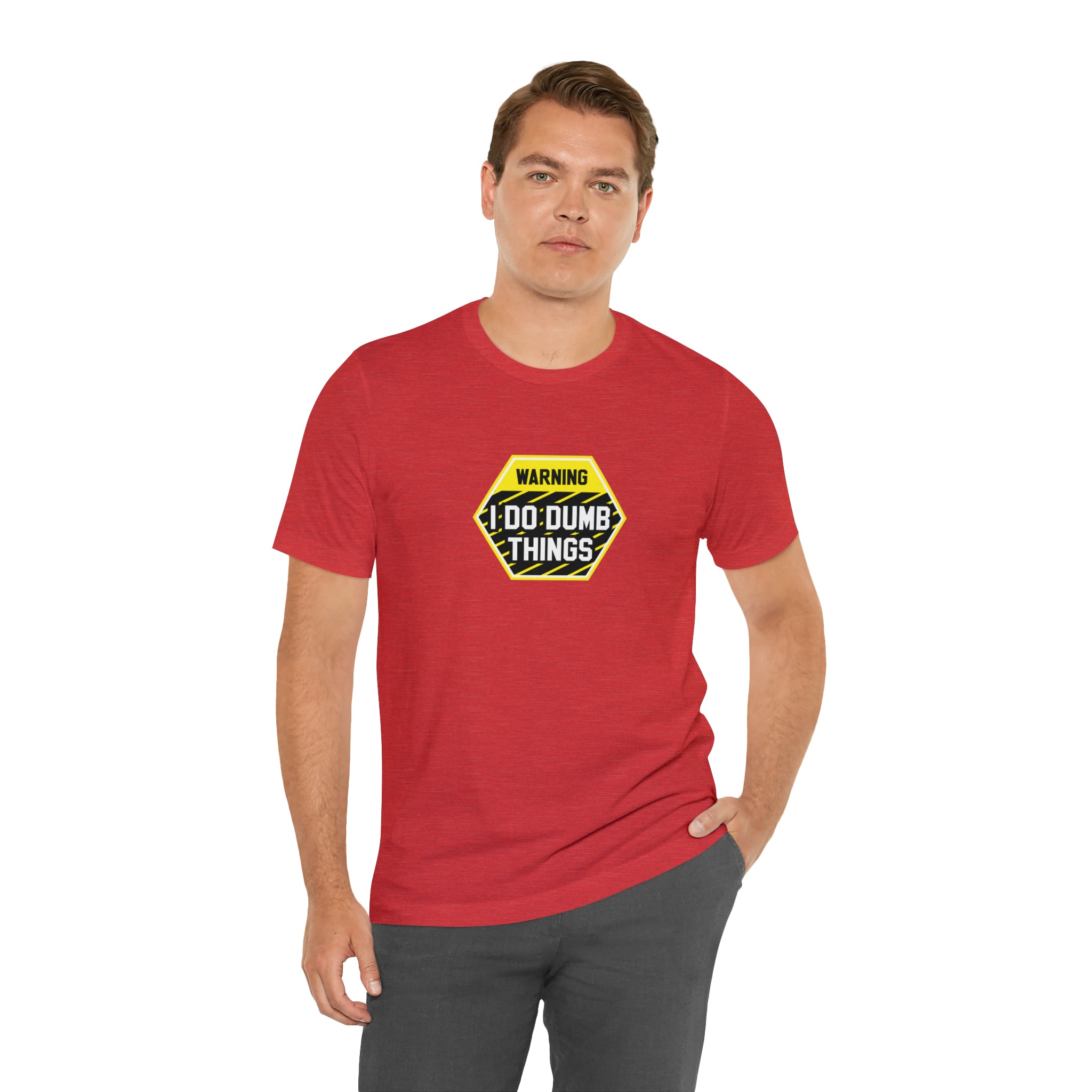 A man wearing a Printify Warning - I do dumb things T-Shirt with a stop sign on it.