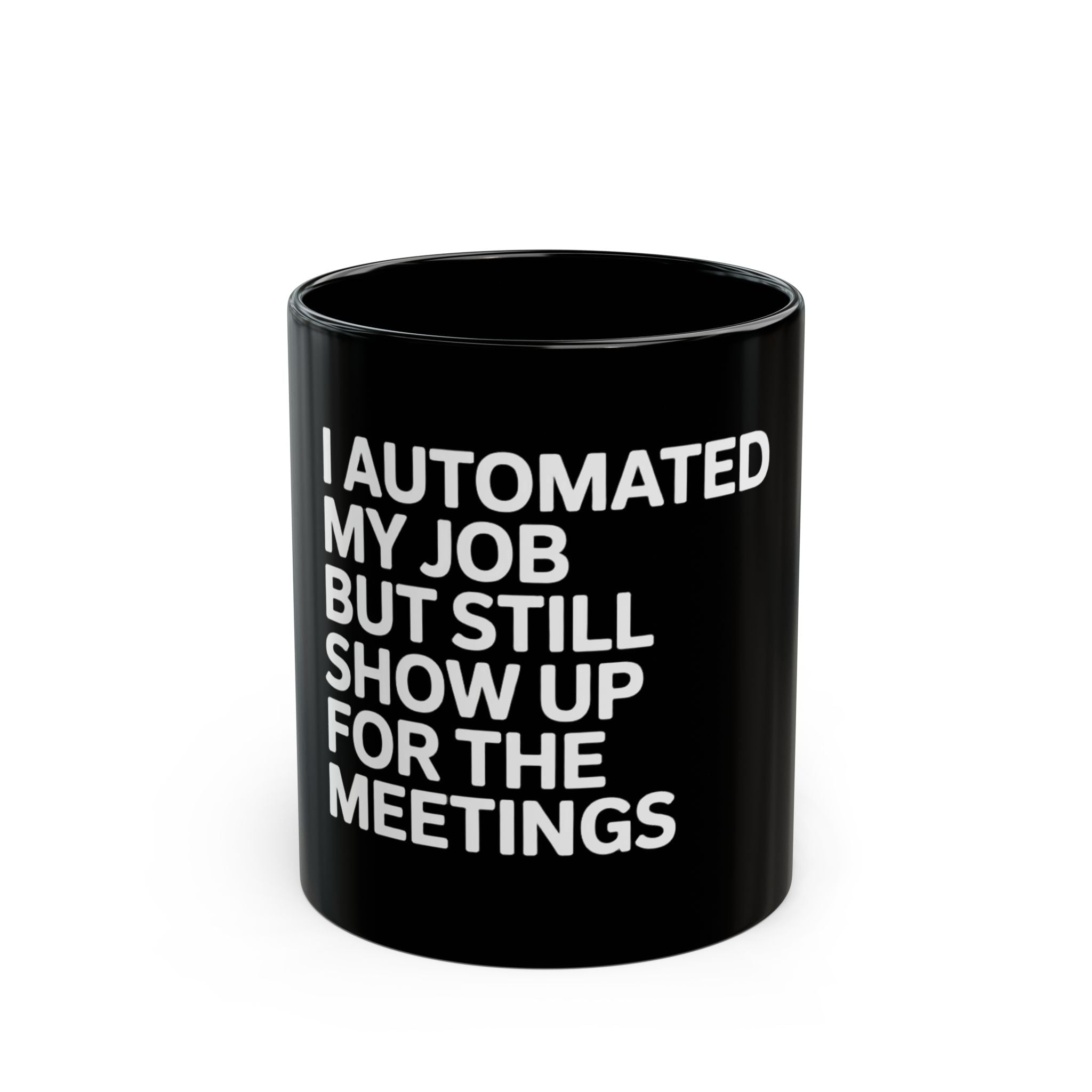 The "I automated my job but still show up for the meetings white - Black Mug" is a ceramic black mug with white text perfect for programmers.