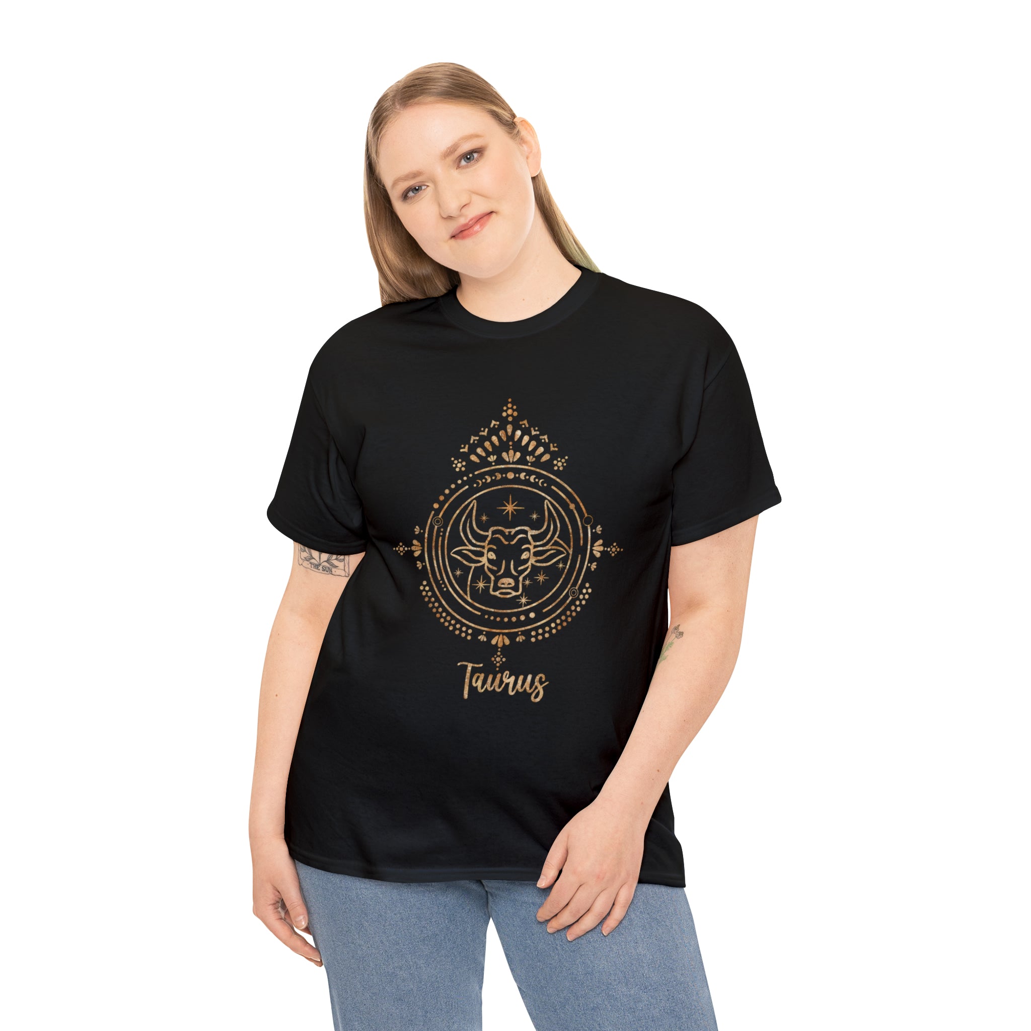 A steadfast woman wearing a black and gold Tauruses t-shirt, embodying the Taurus personality.