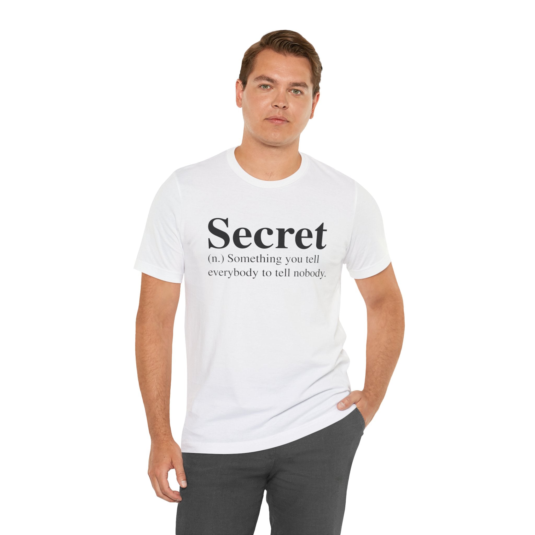 Man in a Secret T-Shirt with the word "secret" and its humorous definition printed in quality print, standing against a white background.