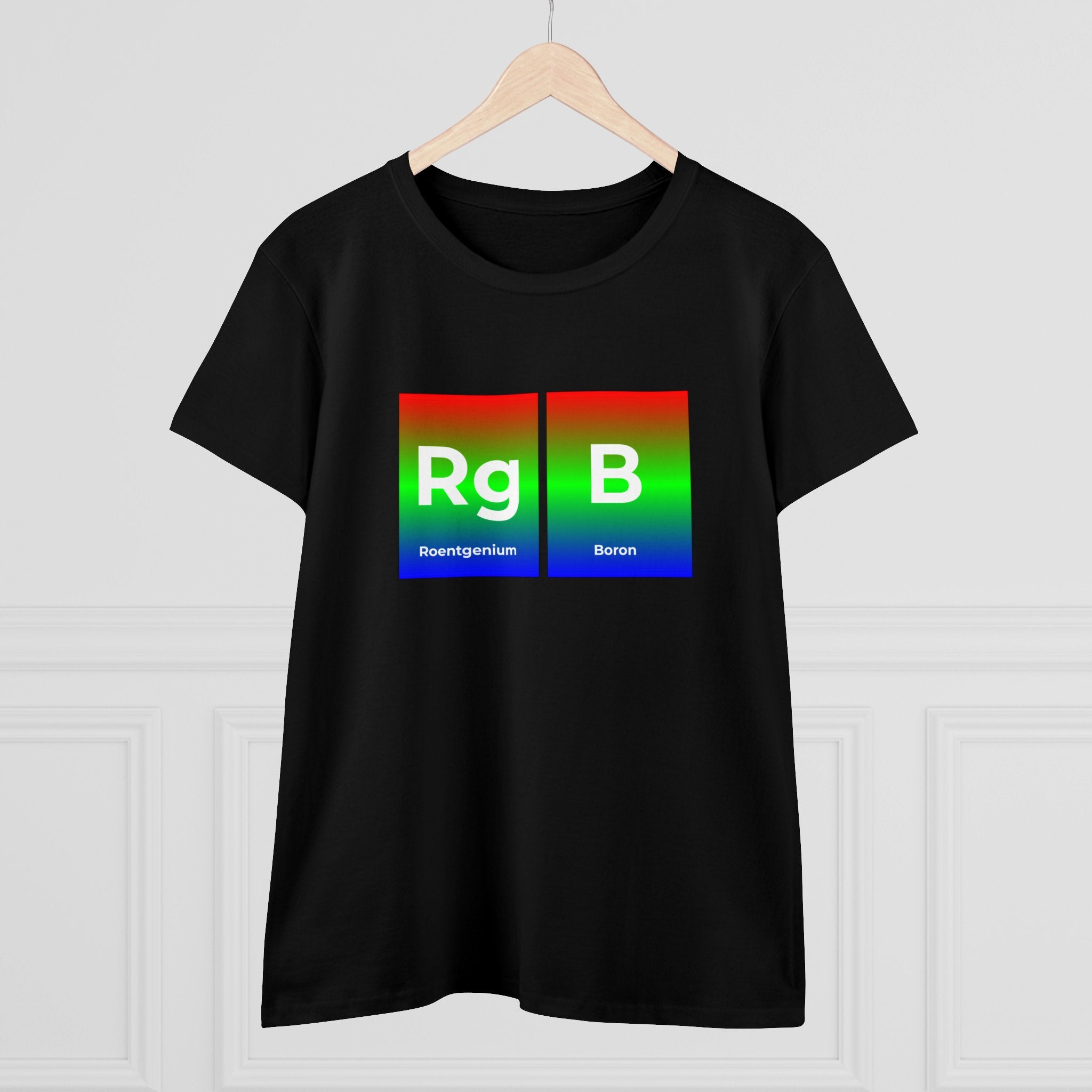 RG-B - Women's Tee in black cotton, featuring chemical symbols "Rg" for Roentgenium and "B" for Boron displayed in RGB color gradient boxes, hanging on a wooden hanger. This piece is a perfect addition to any ethical fashion wardrobe.