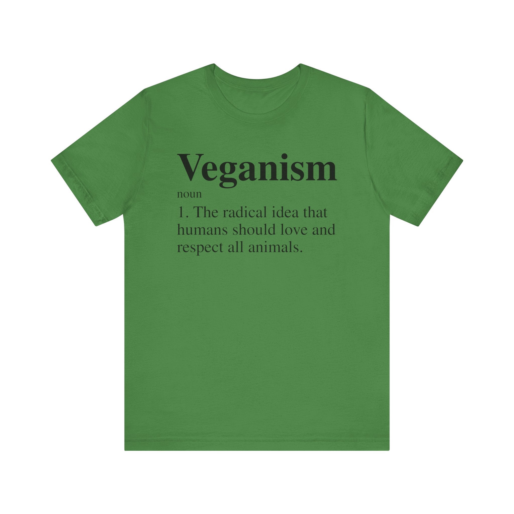 Green unisex Veganism T-shirt with the definition of "veganism" printed in white text on the front.