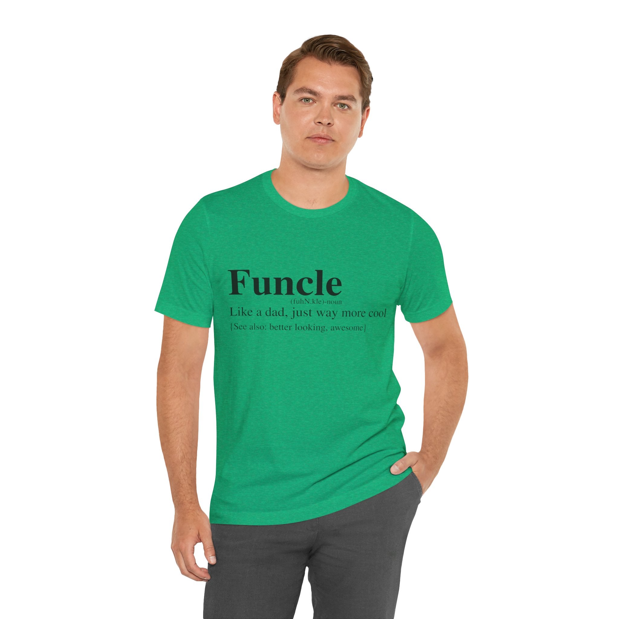 Man in green Funcle T-Shirt labeled "Funcle" standing with one hand on his hip, looking at the camera.
