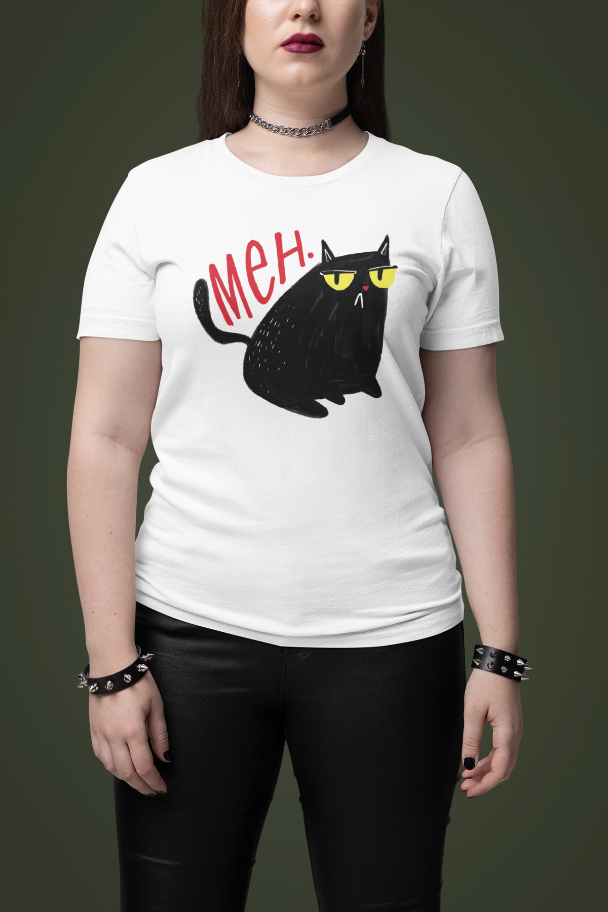 'Meh' black cat T-shirt in white, woman wearing it against a dark backdrop, funny cat lover gift