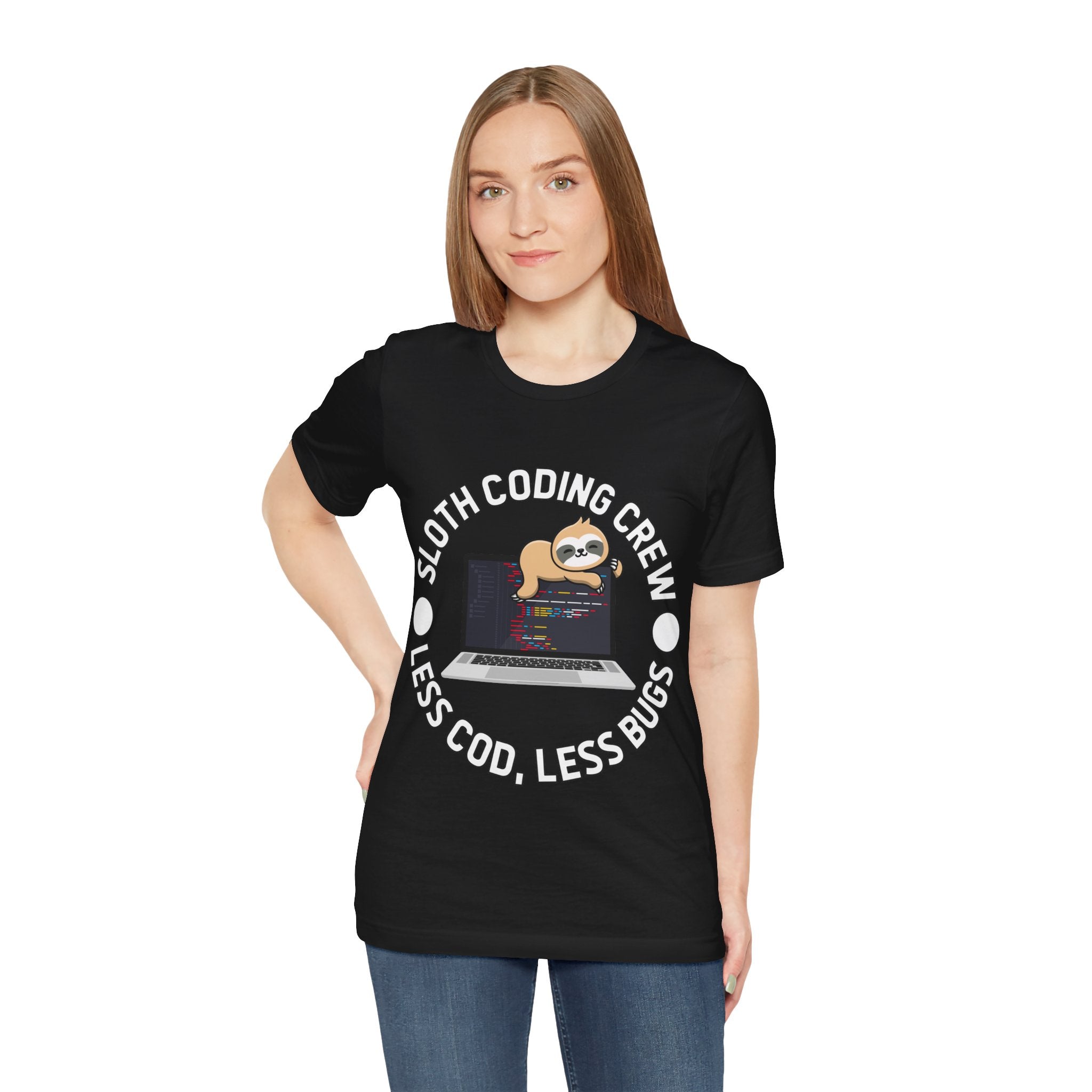 Young woman wearing a black unisex jersey tee with a "Sloth Coding Crew Less Cod Less Bugs" graphic, featuring a cartoon sloth on a laptop.