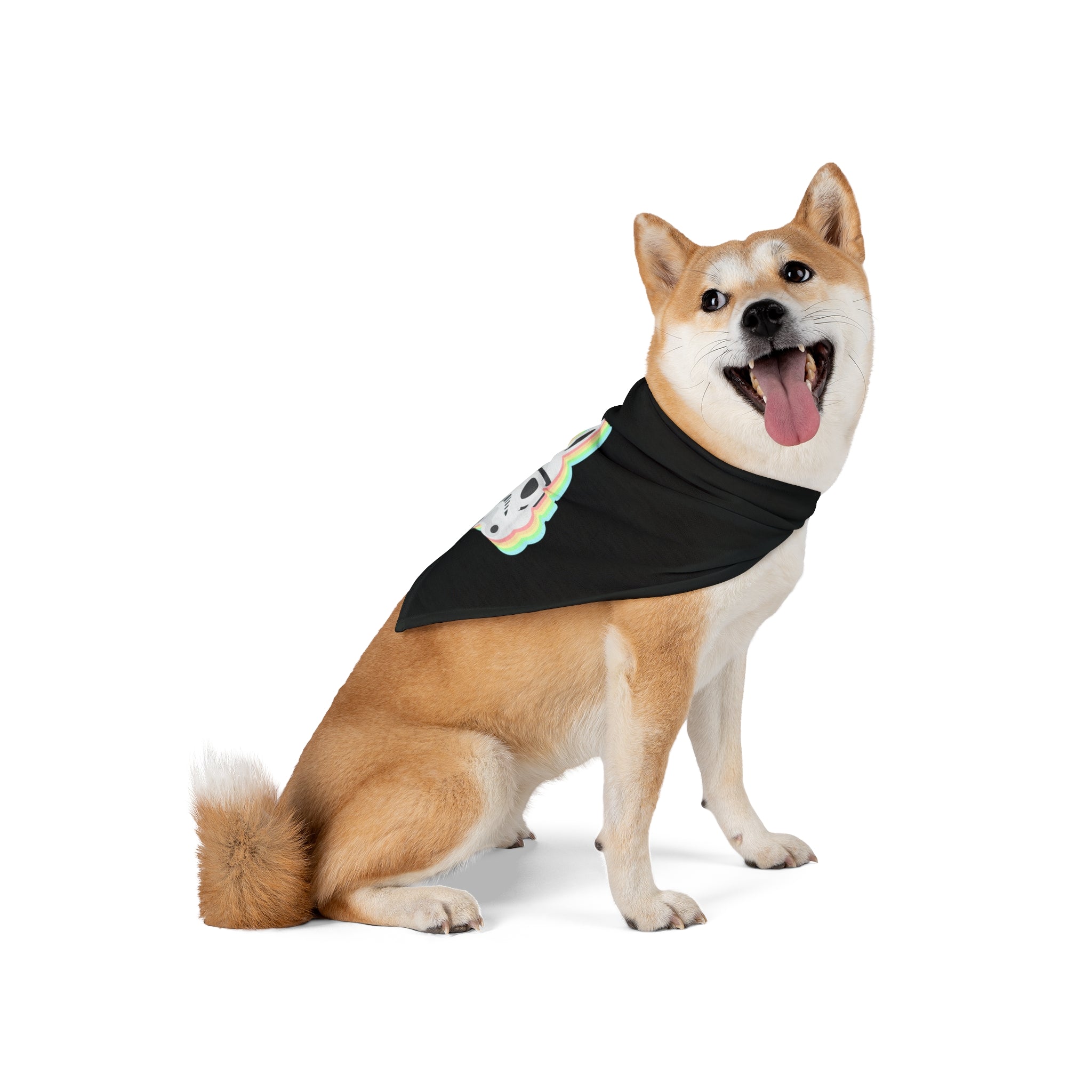 A Shiba Inu dog wearing a Star Wars Easter Stormtrooper - Pet Bandana with a colorful design, sitting with its tongue sticking out and looking slightly to the side.