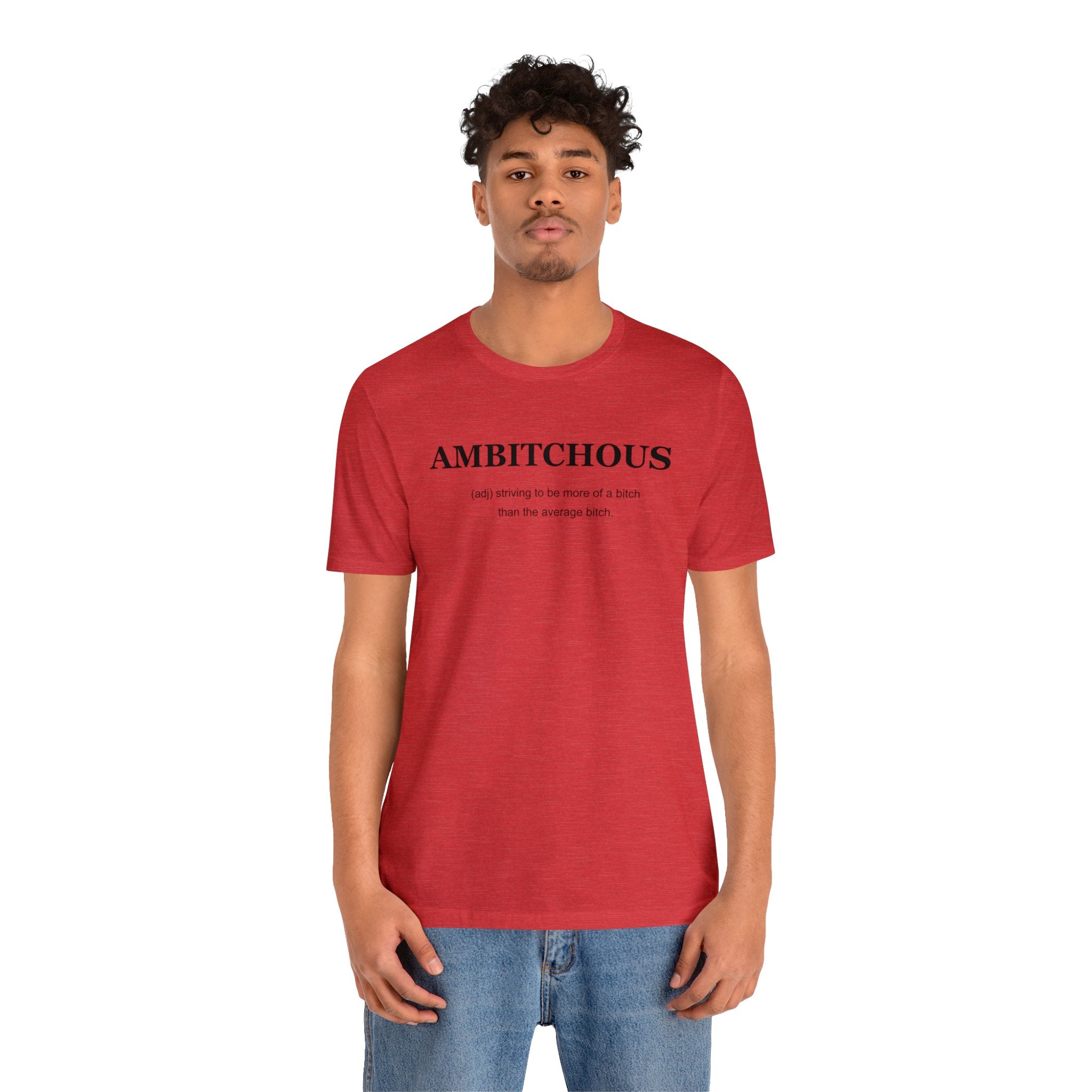 A man wearing a red Ambitchious T-shirt.