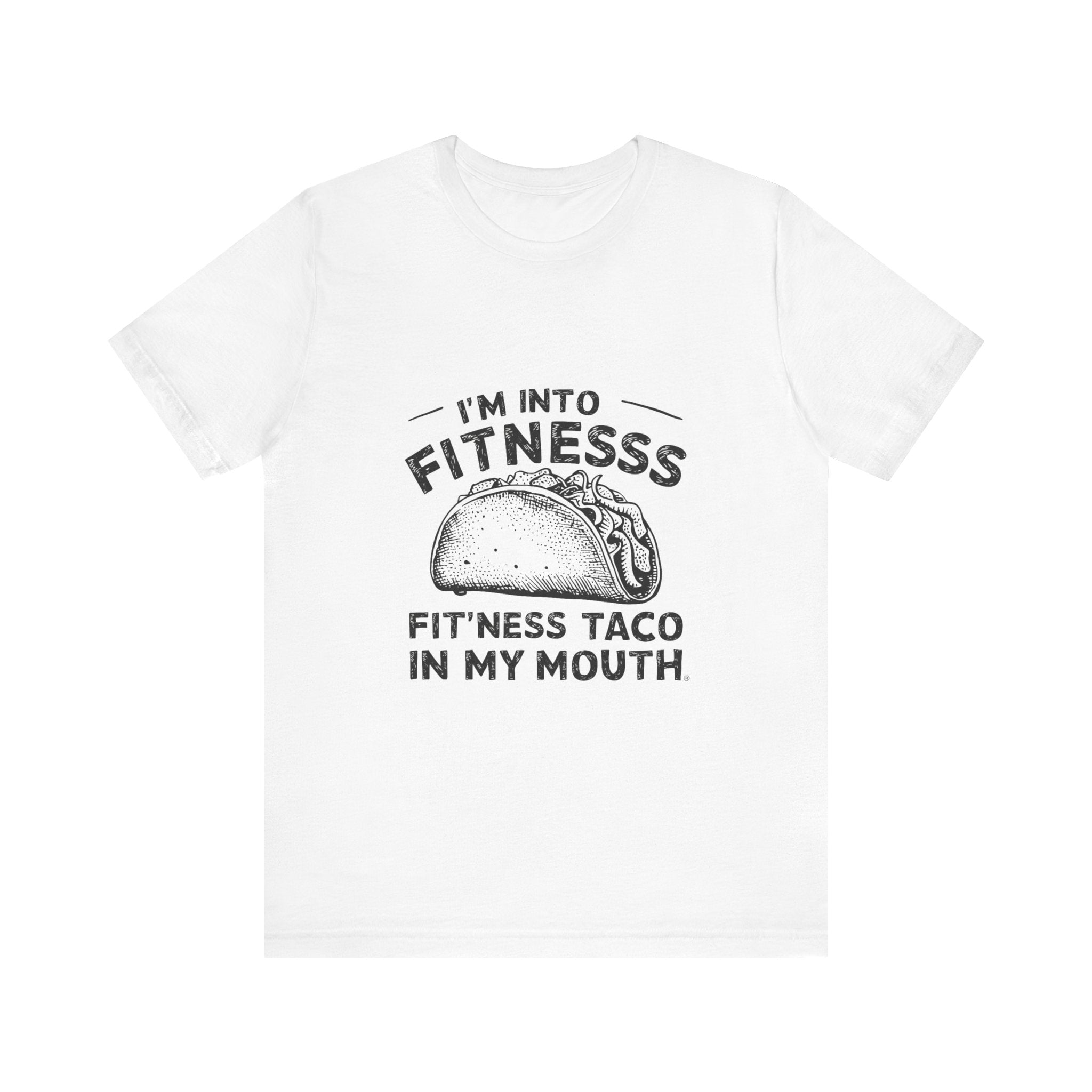 The "Im into Fitness - T-Shirt" showcases a whimsical taco illustration accompanied by the phrase "I'm into fitnesss fit'ness taco in my mouth," and is made from soft Airlume combed, ring-spun cotton for exceptional comfort.