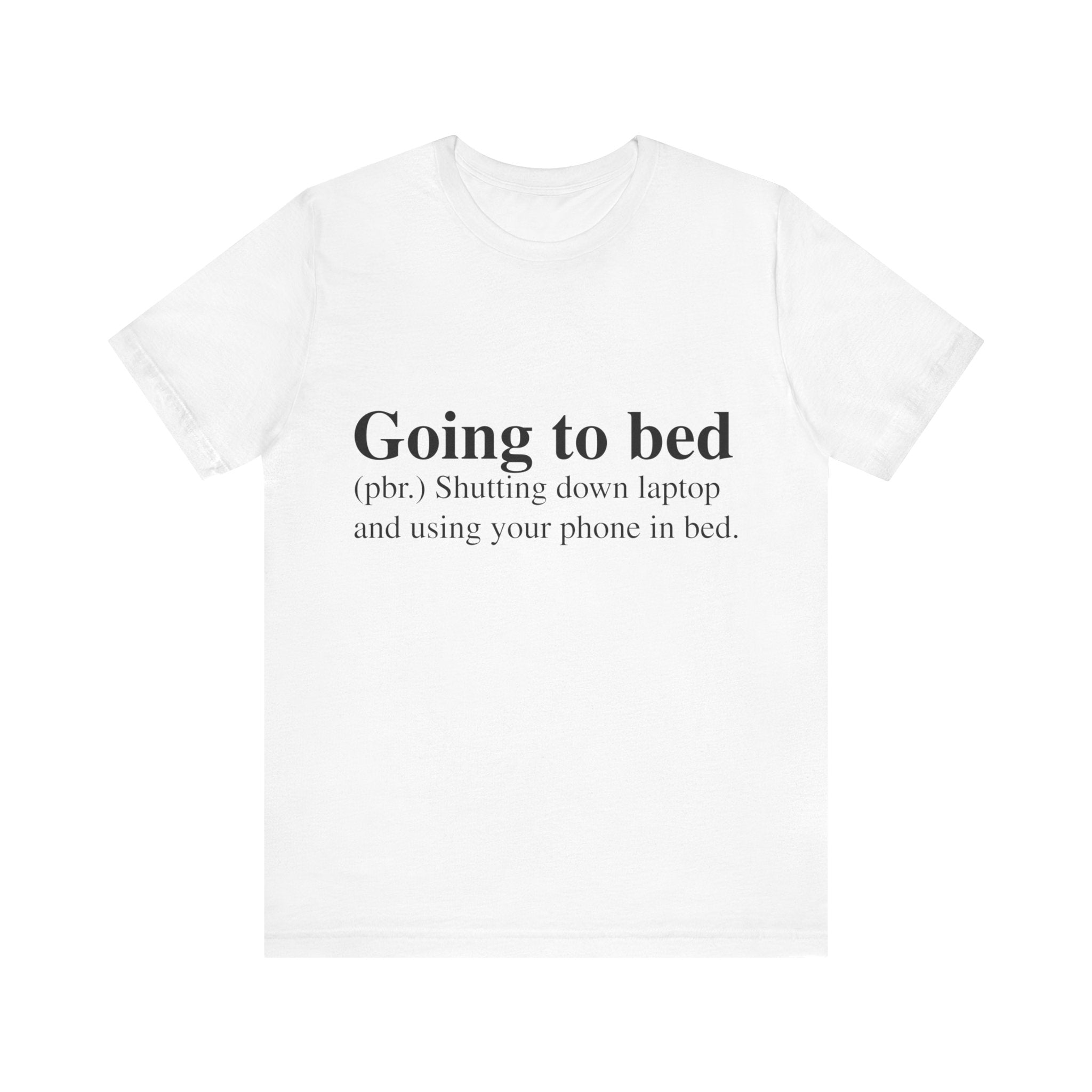 White short sleeve Going to Bed T-Shirt with definition-style text that humorously defines "going to bed" as shutting down a laptop and using a phone in bed.