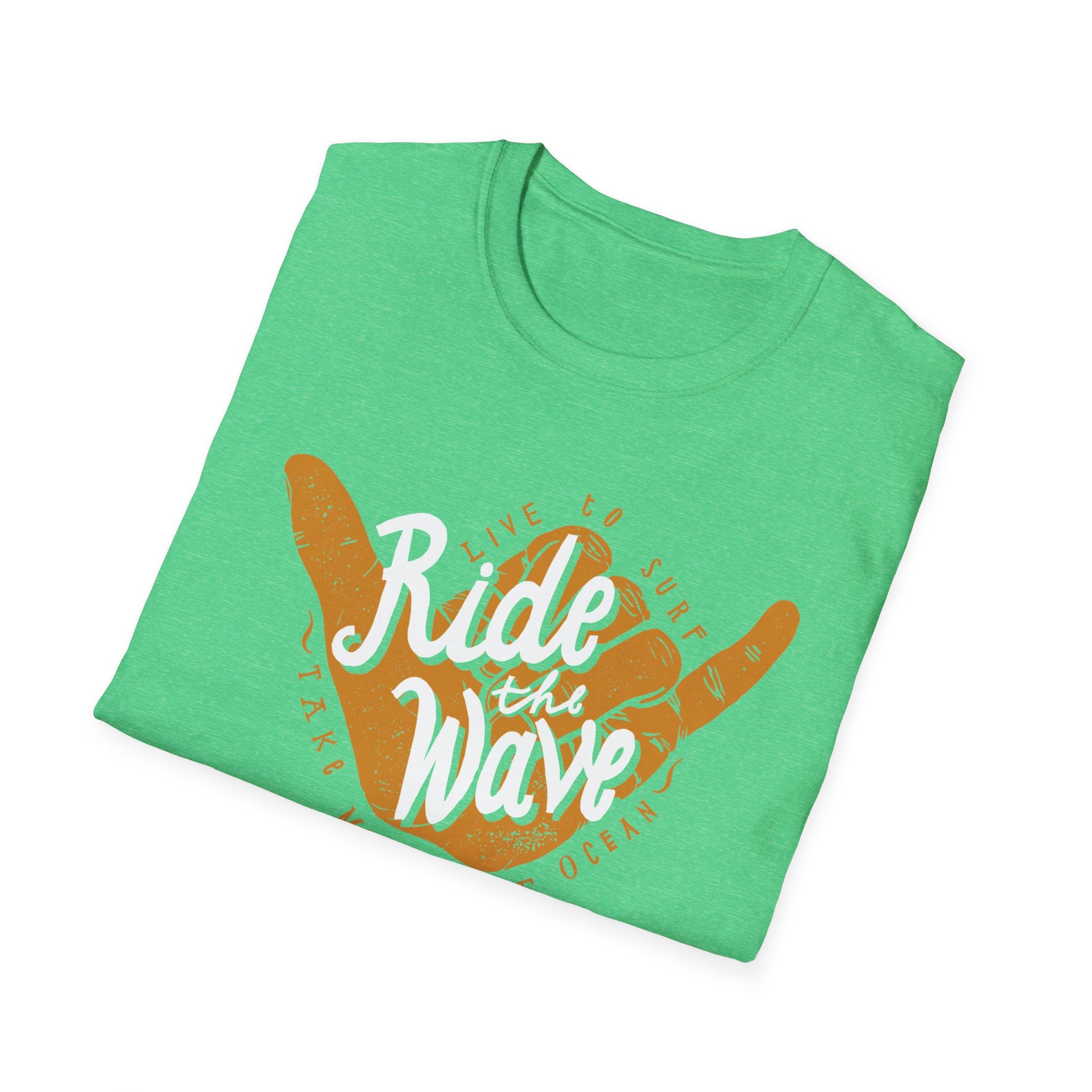 The "Ride the Wave" T-Shirt is crafted from folded green cotton fabric and showcases vibrant orange text reading "Ride the Wave," accompanied by a hand gesture graphic. This stylish tee embodies surf's up vibes in every stitch.