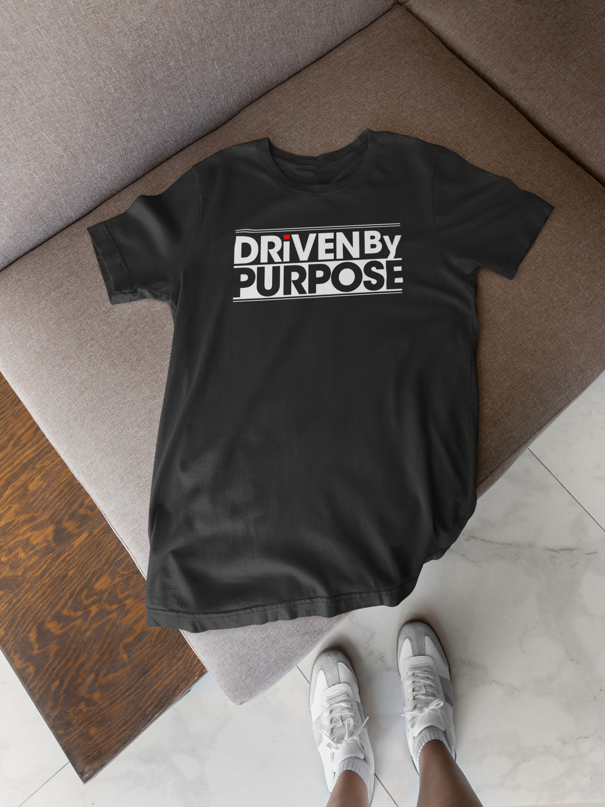 Driven by Purpose T-Shirt in black, styled as a wrapped gift box, motivational surprise gift idea