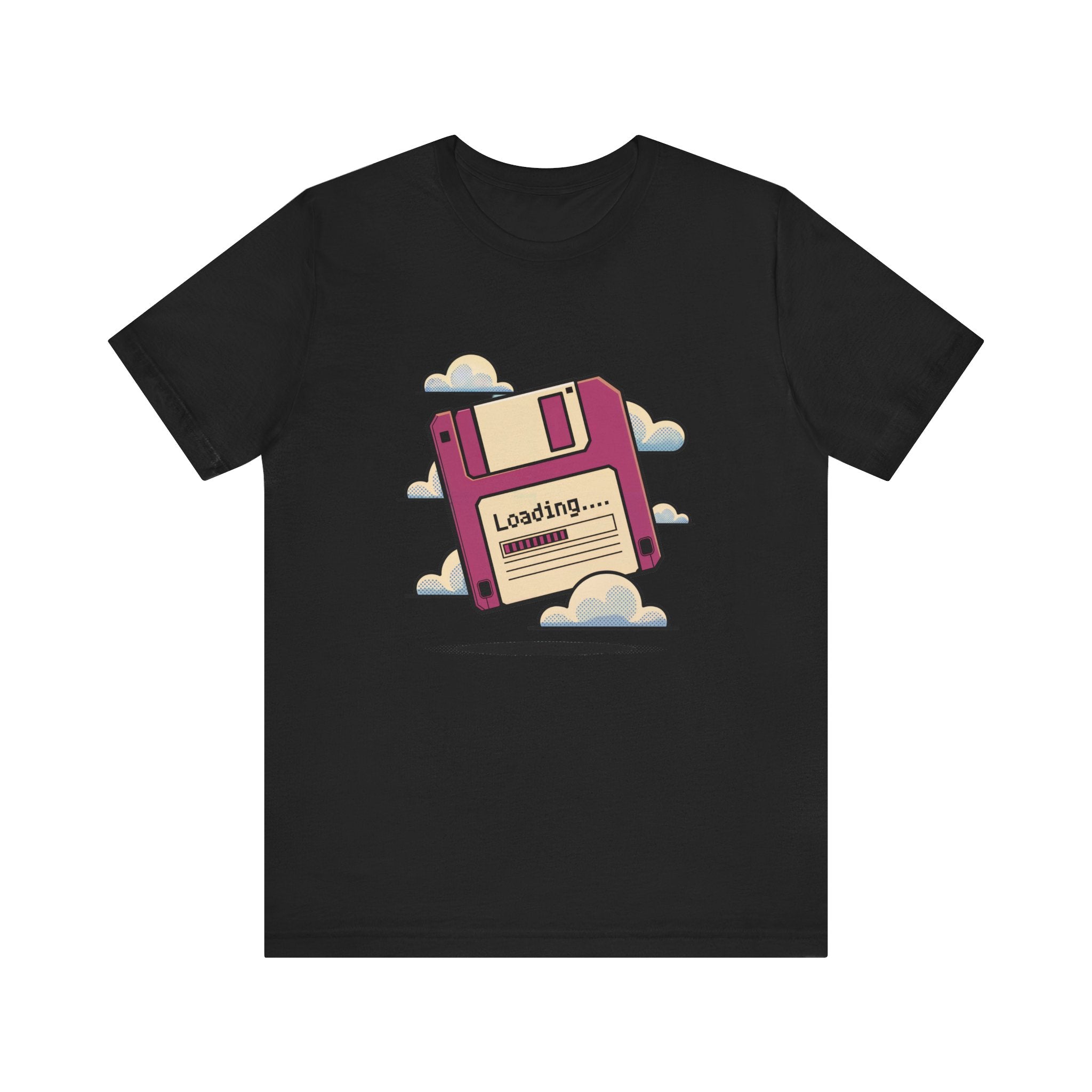 The Floppy disk -T Shirt is a black tee with a pink floppy disk graphic labeled "Loading..." amidst clouds. Made from soft cotton, it features tapered shoulders for a modern fit.