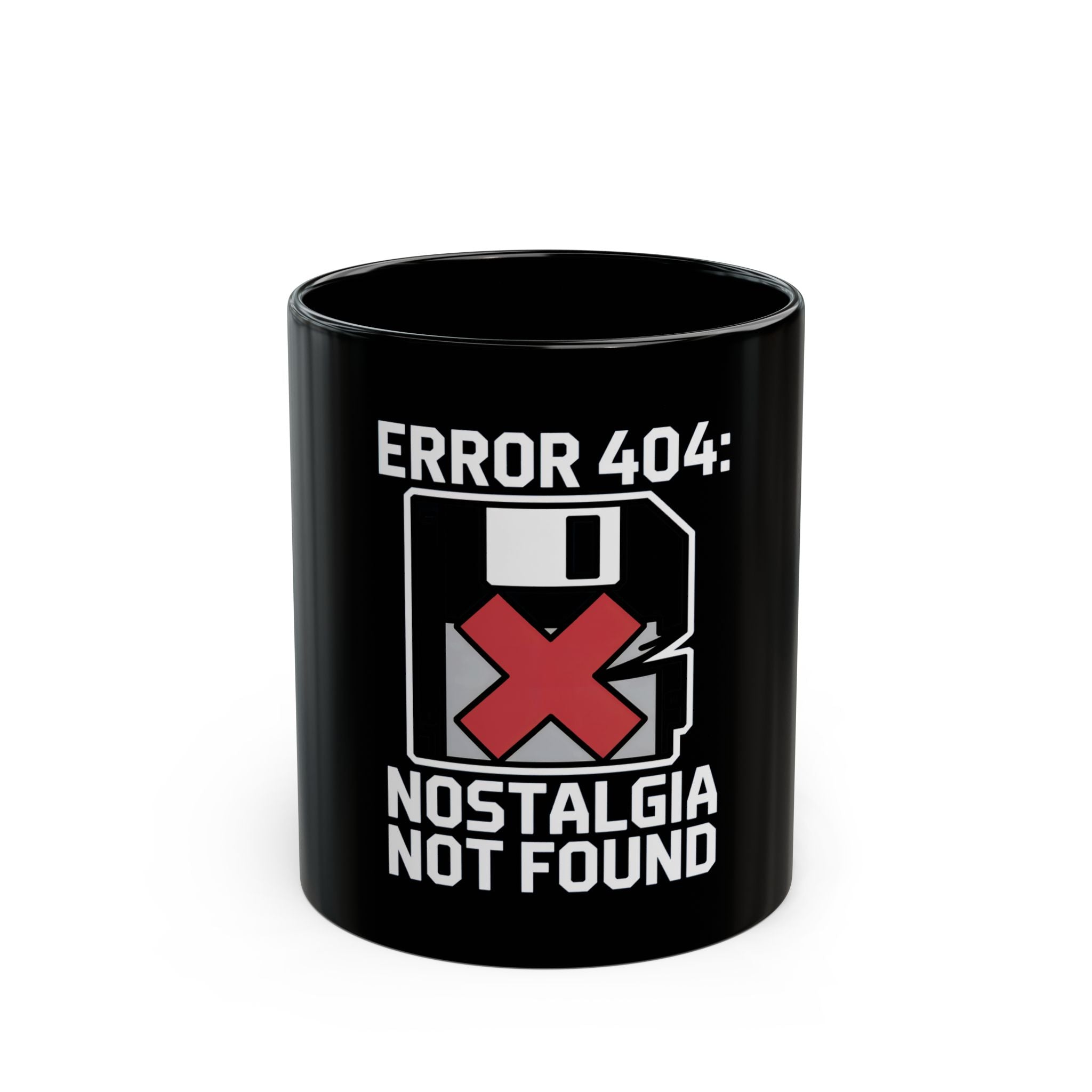 The Error 404 Nostalgia Not Found - Black Mug features a graphic of a floppy disk and the phrase "ERROR 404: NOSTALGIA NOT FOUND," making it ideal for fans of retro tech and clever code humor.