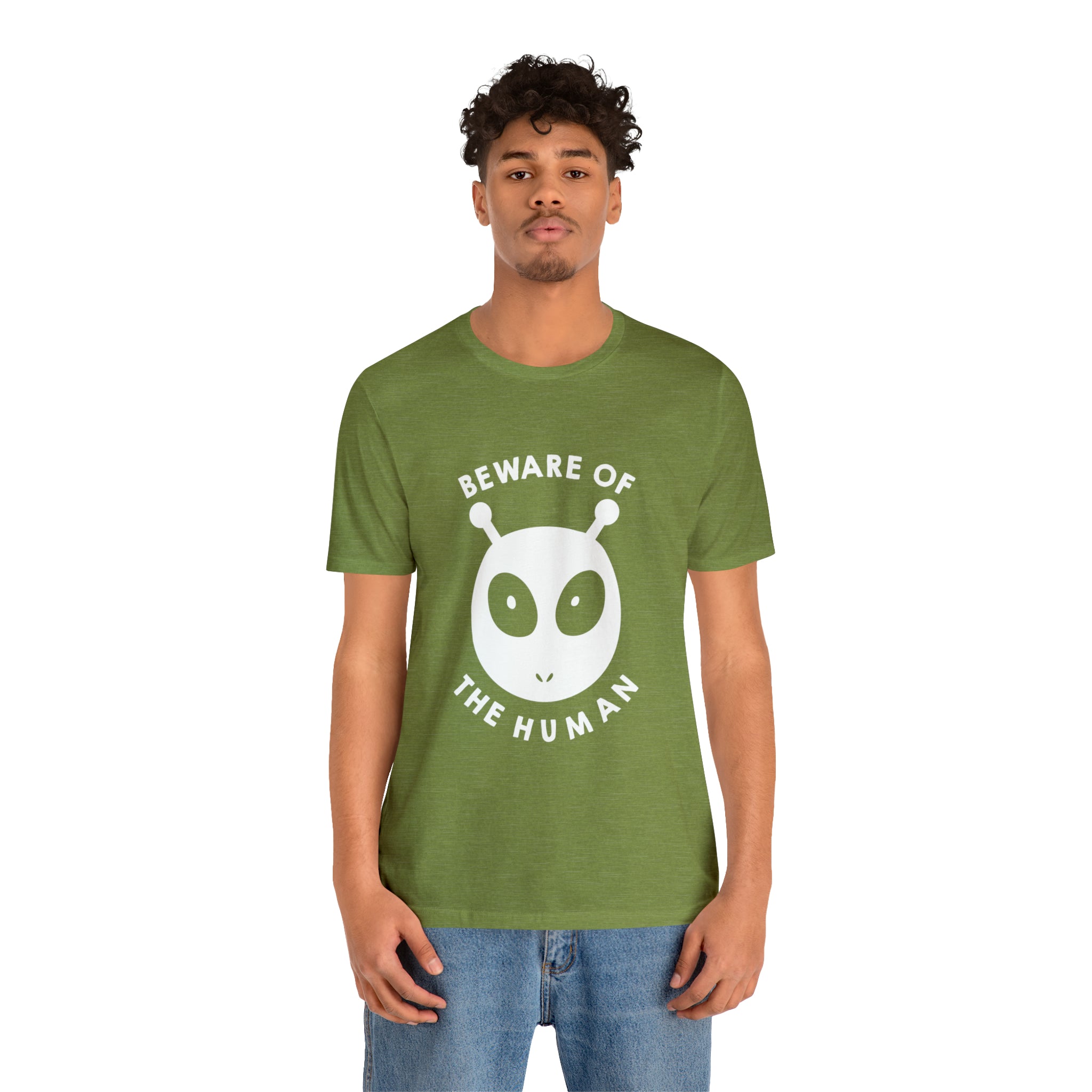 A man wearing a green Printify Beware of the humans T-Shirt.