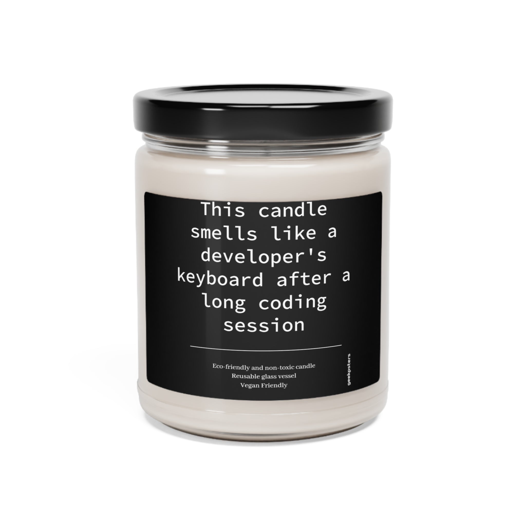 A novelty candle, encased in glass jars and labeled as smelling like a This candle smells like a developer's keyboard after a long coding session - Scented Soy Candle, 9oz.
