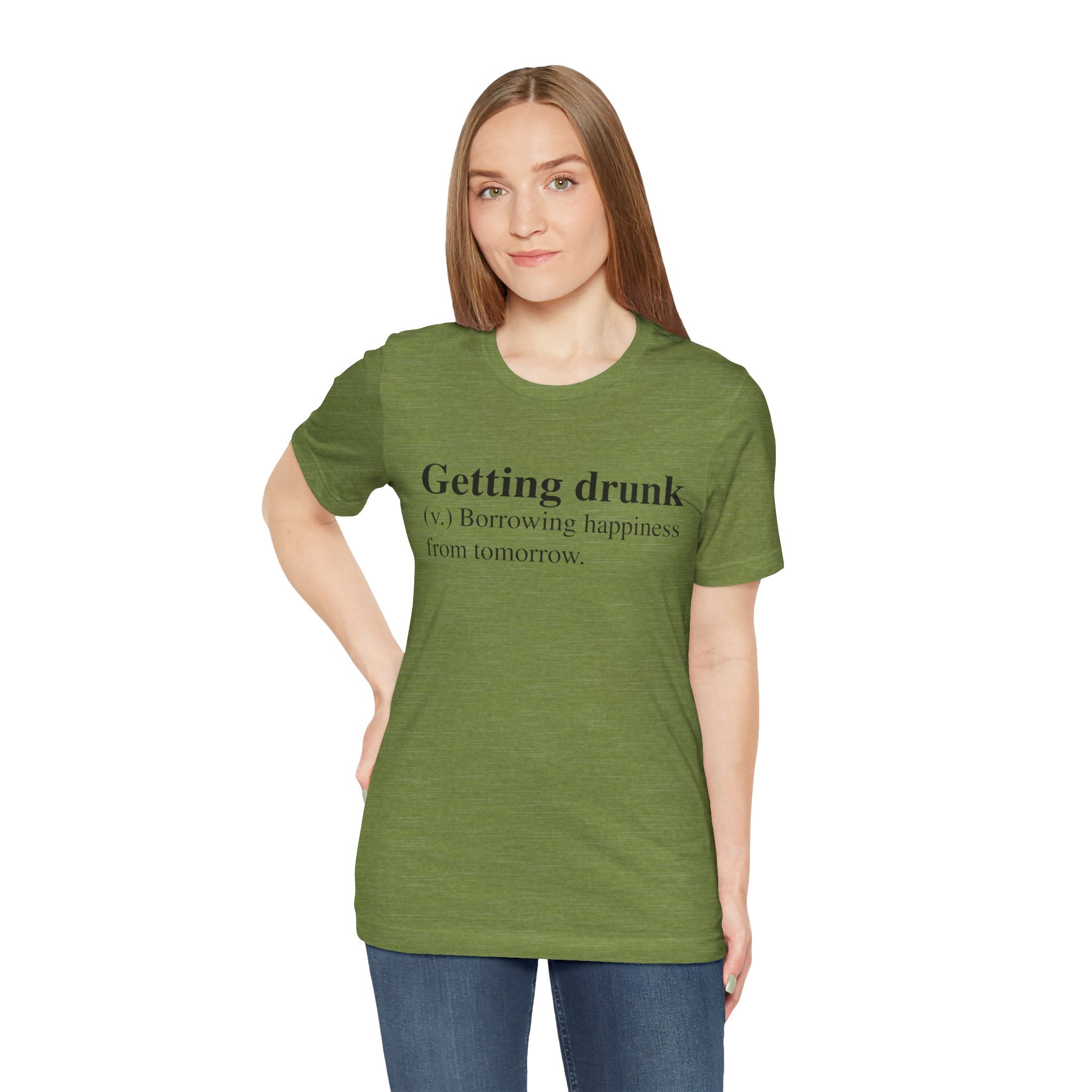 Young woman in a green, soft cotton Getting Drunk T-Shirt with the text "getting drunk (v.) borrowing happiness from tomorrow.