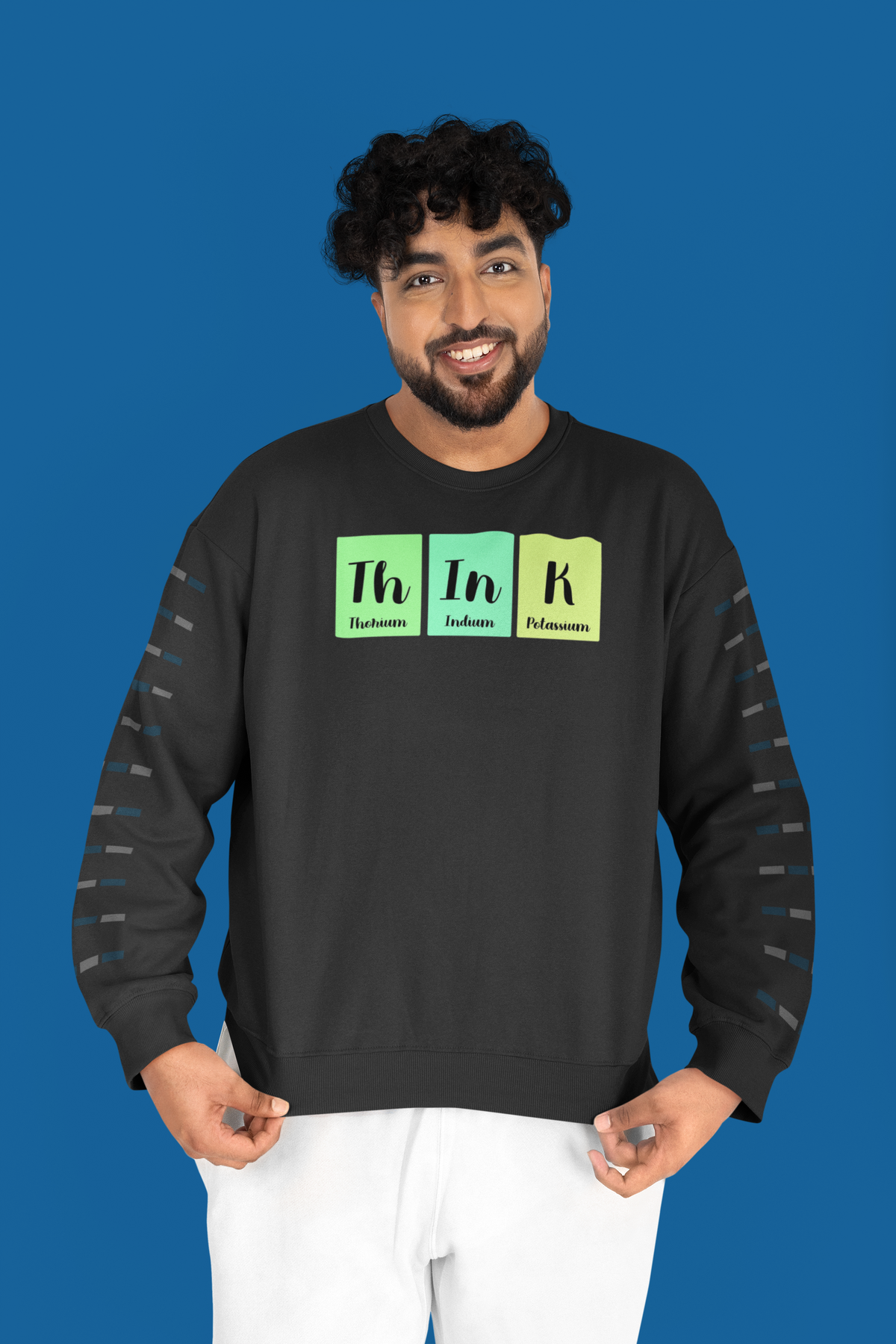'Think' periodic table sweatshirt in black, man wearing it against a blue backdrop, funny chemistry thinker gift