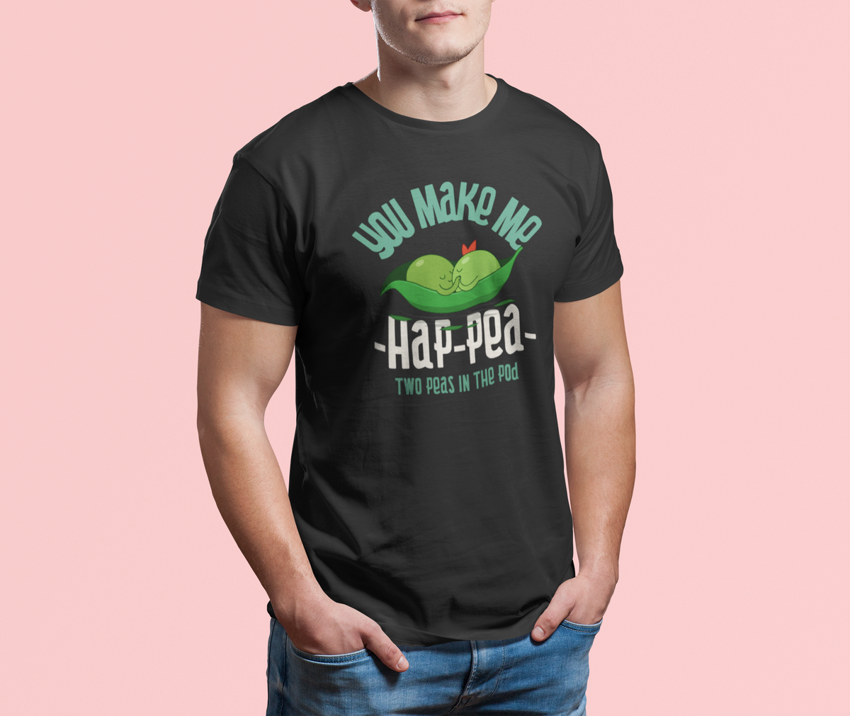 'You Make Me Hap-Pea' pea pun t-shirt in black, man wearing it against a pink backdrop, funny gift for girlfriend