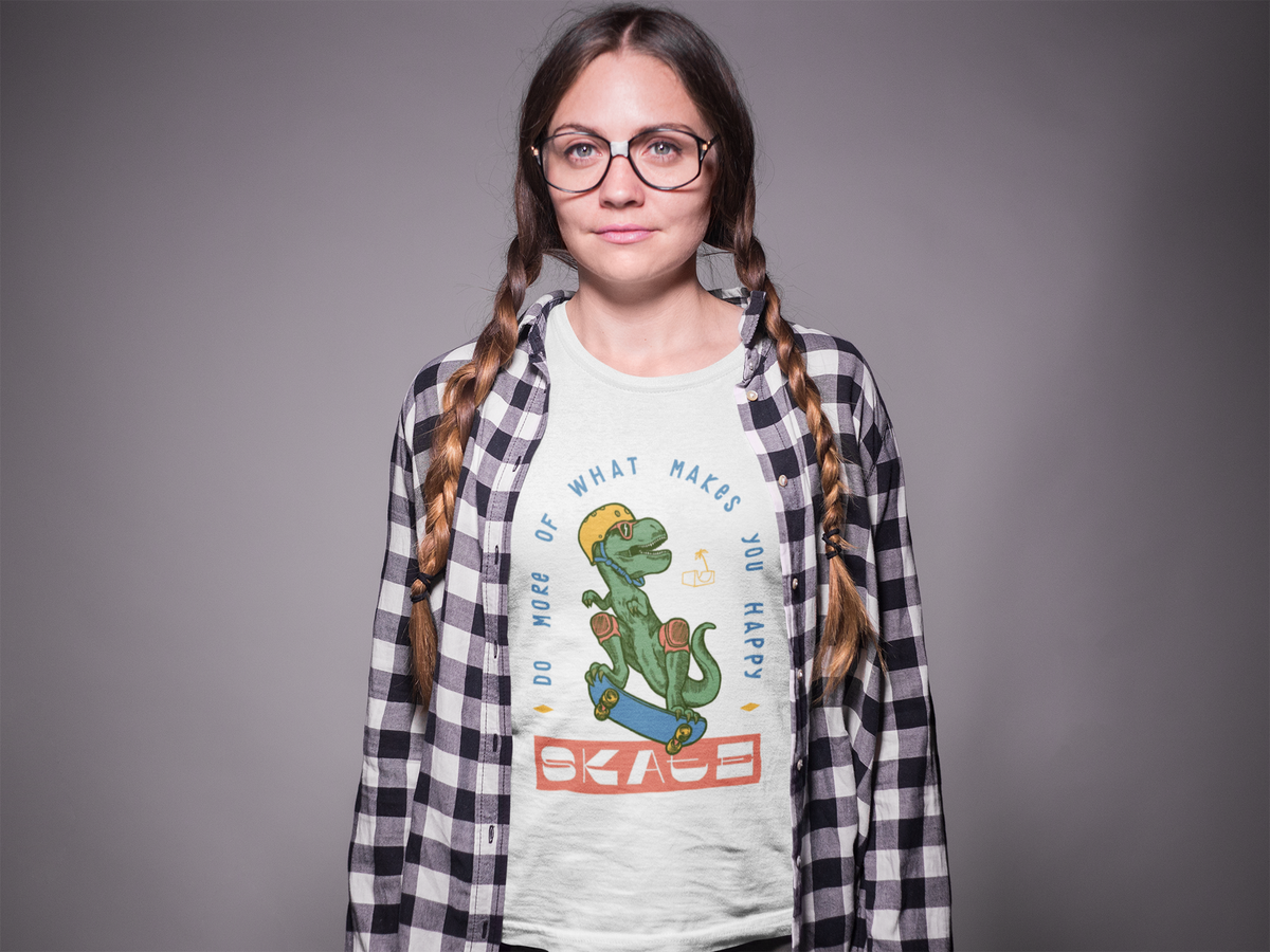 "Do More of What Makes You Happy" dino skateboarding t-shirt in white, woman wearing it, funny gift