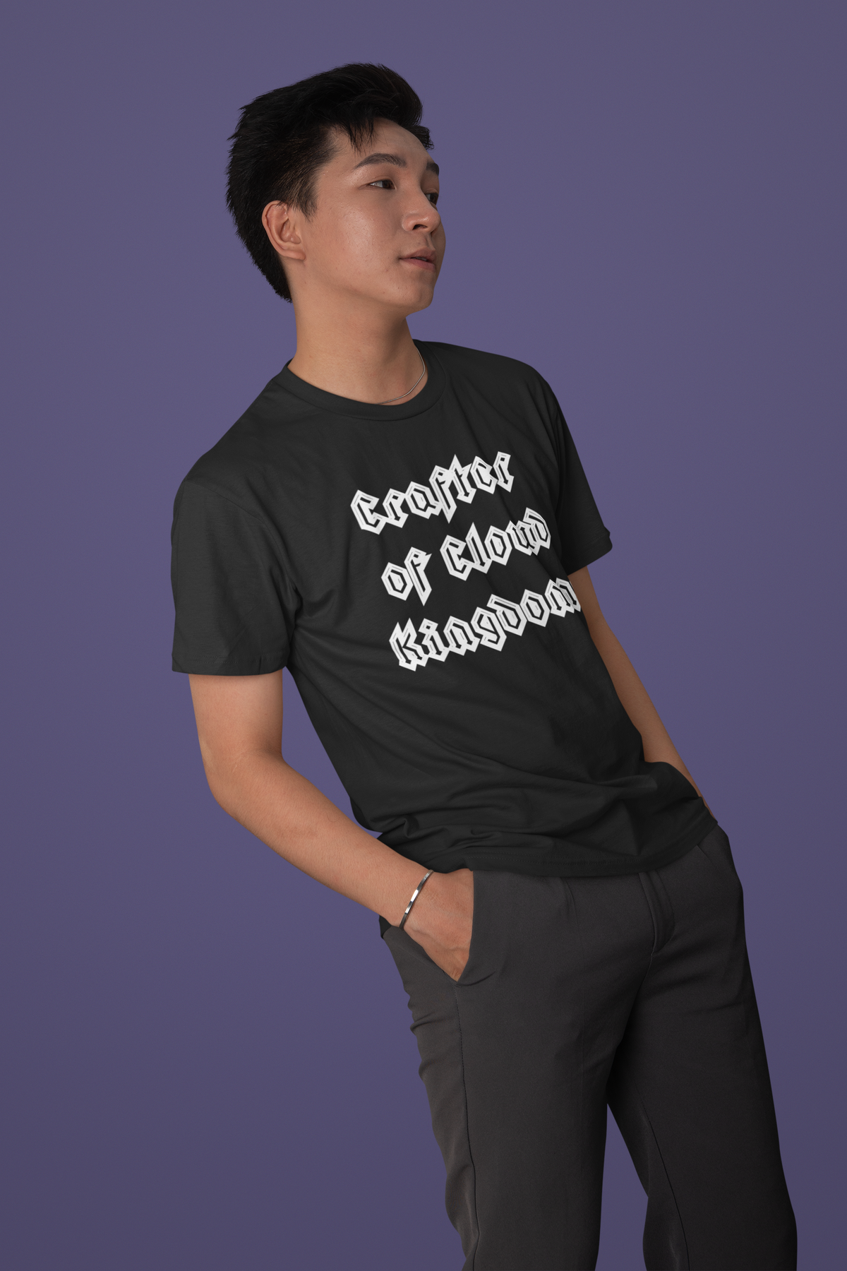 'Crafter of Cloud Kingdoms' organic t-shirt in charcoal grey, man wearing it in profile, developer gift