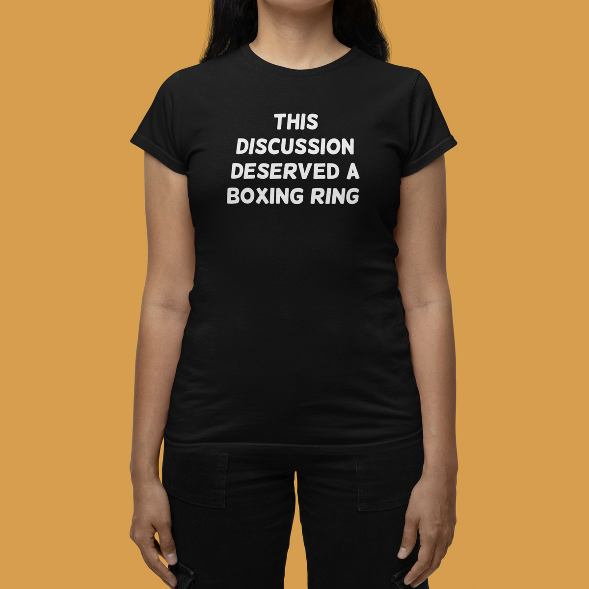 'This Discussion Deserved a Boxing Ring' women's tee in black, woman on orange background, funny sarcastic gift