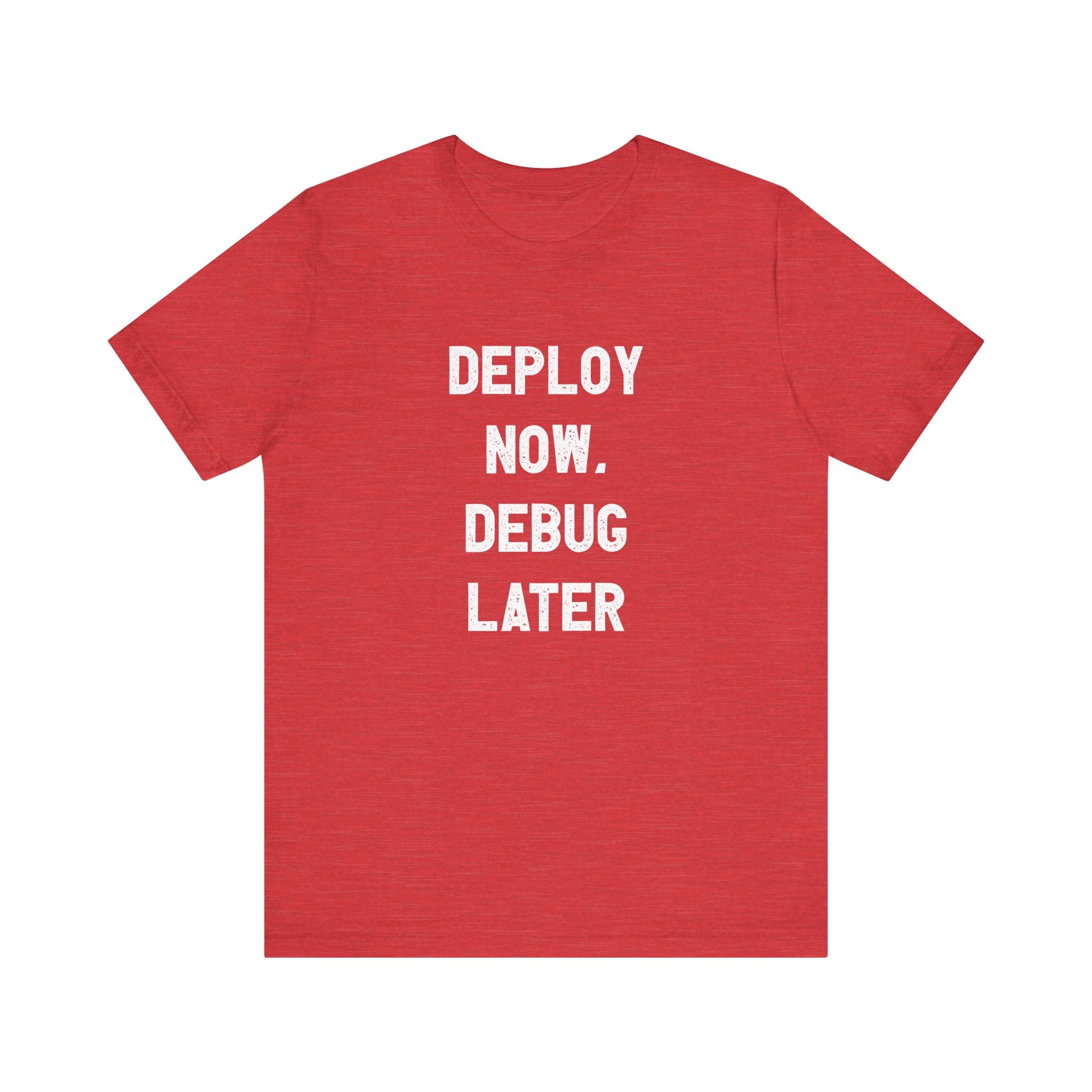 The "Deploy Now, Debug Later - T-Shirt" is a red tee featuring white text that reads "Deploy Now. Debug Later." It's an essential piece for those who love the humor and pace of coding life.