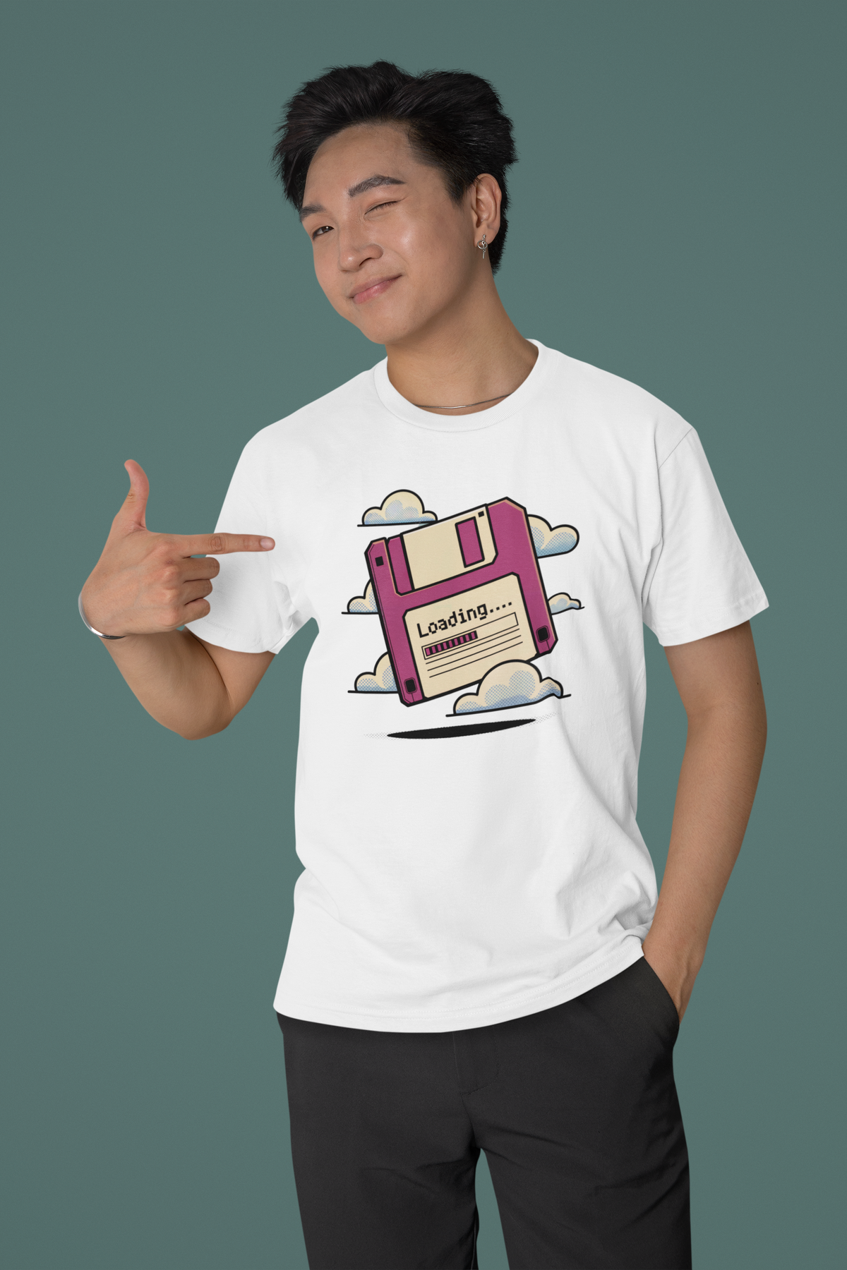 'Floppy Disk Loading' t-shirt in white, man wearing it pointing at print, funny nostalgic programmer gift