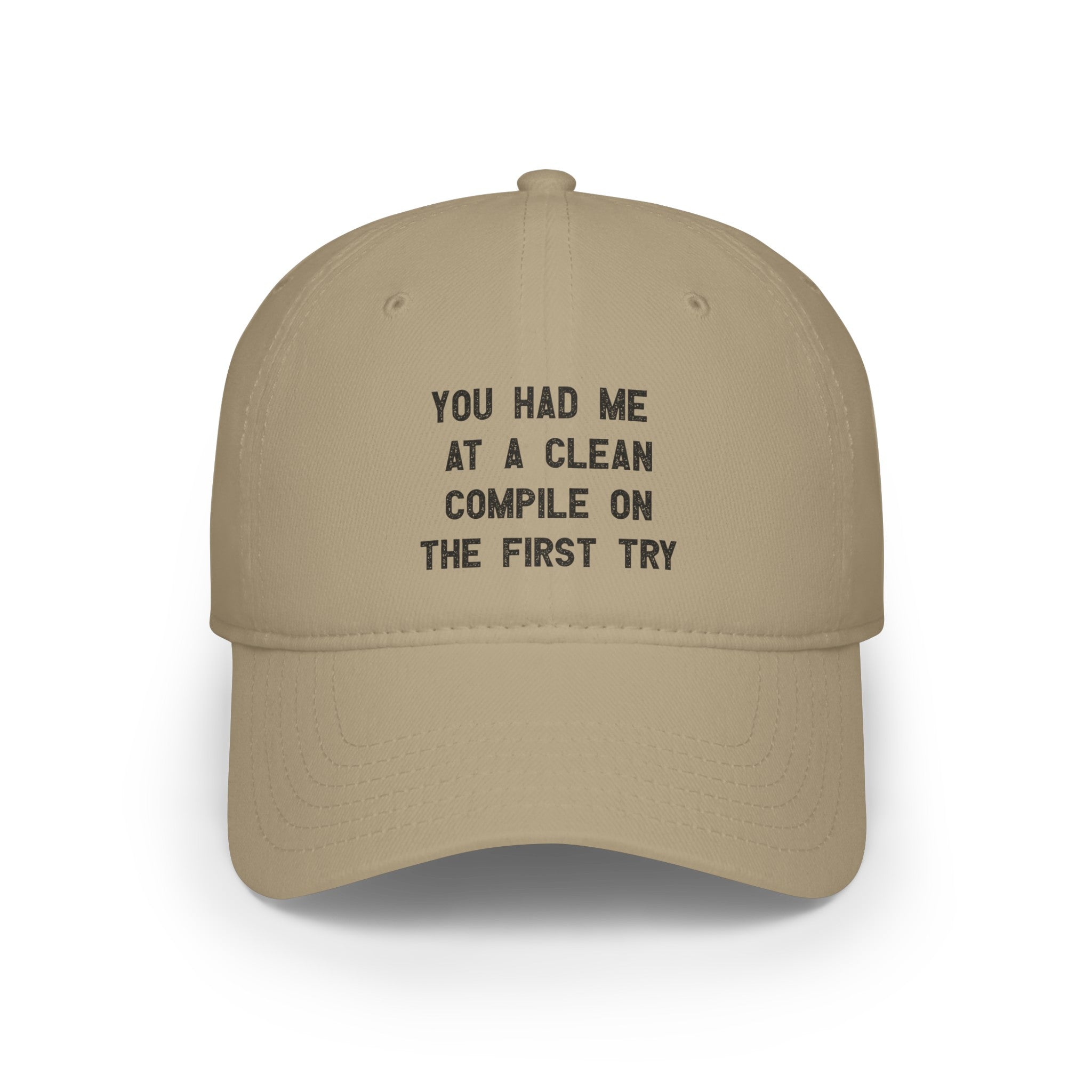 A You Had Me At a Clean Compile on the First Try - Hat with reinforced stitching features the phrase "YOU HAD ME AT A CLEAN COMPILE ON THE FIRST TRY" printed in black text on the front, making it perfect for those fluent in coder lingo.