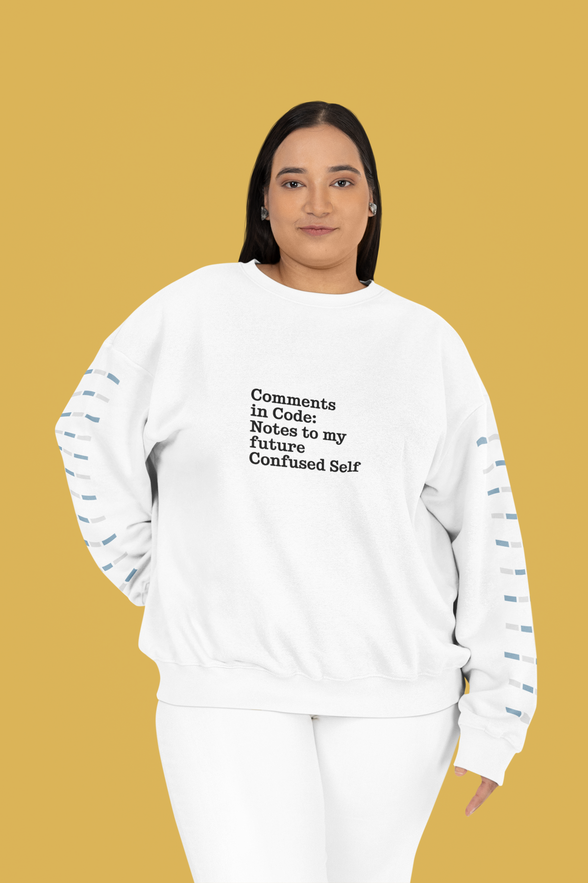 'Comments in Code' sweatshirt in white, woman wearing it on mustard background, funny gift for developers