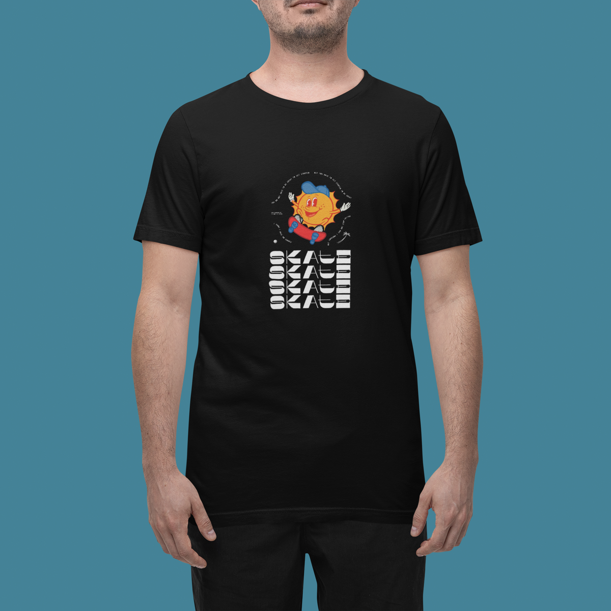 'Skate Skate Skate' t-shirt in black, man wearing it in a studio, T-Shirt mockup, Geekpsters