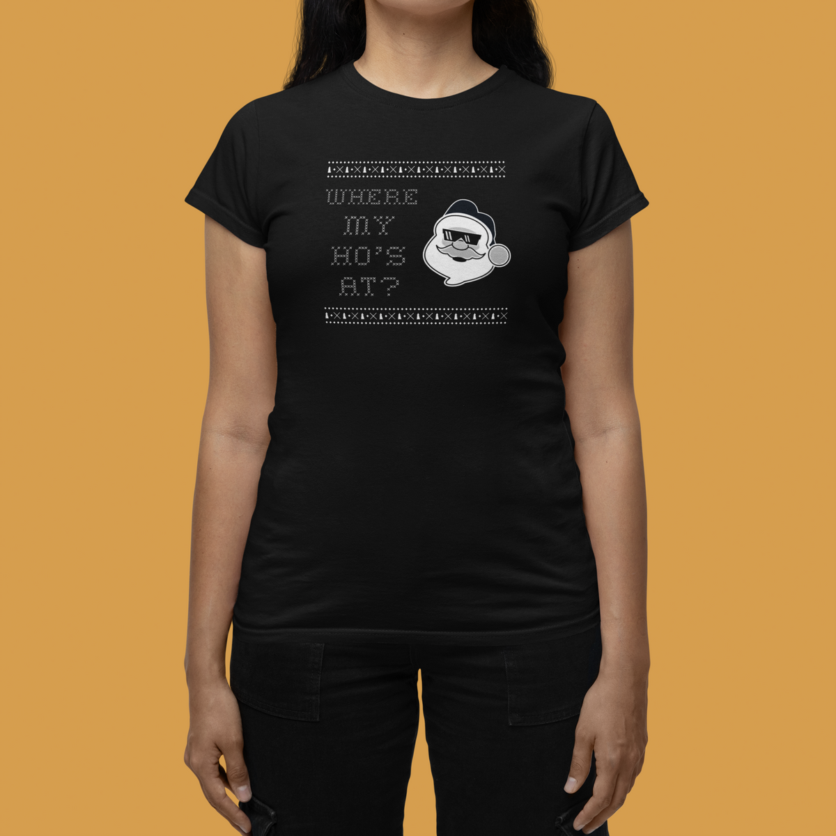 'Where My Ho's At' Santa graphic women's tee in black, woman wearing it on yellow backdrop, funny Christmas gift