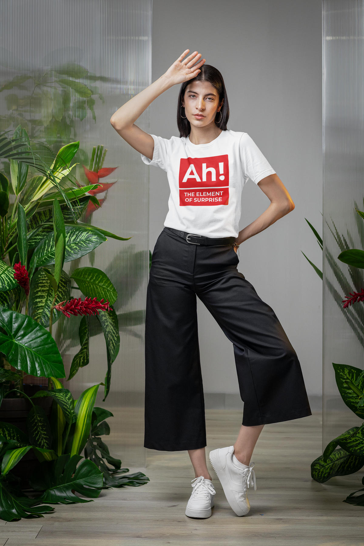 'Ah! The Element of Surprise' T-shirt in white, woman wearing it among plants, science teacher gift