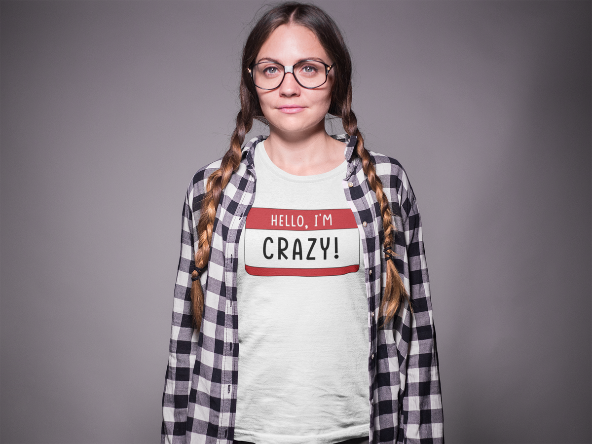 Hello I'm Crazy name tag T-shirt in white, braided woman wearing it, sarcastic gift tee
