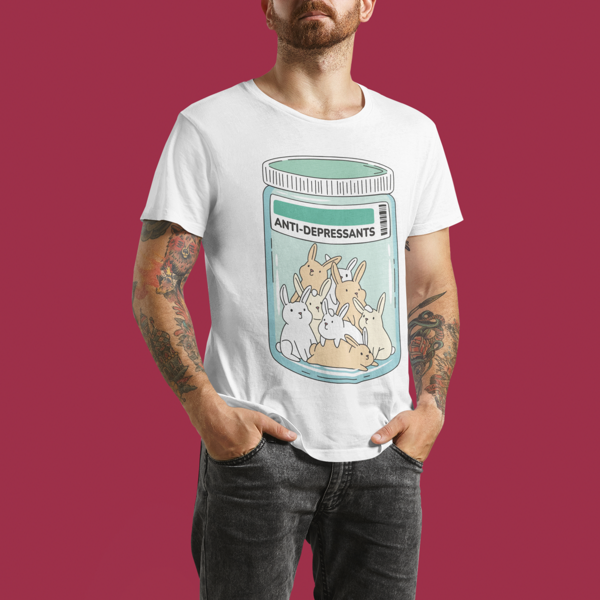 'Anti-Depressants' happy bunnies t-shirt in white, man model wearing it against a maroon background