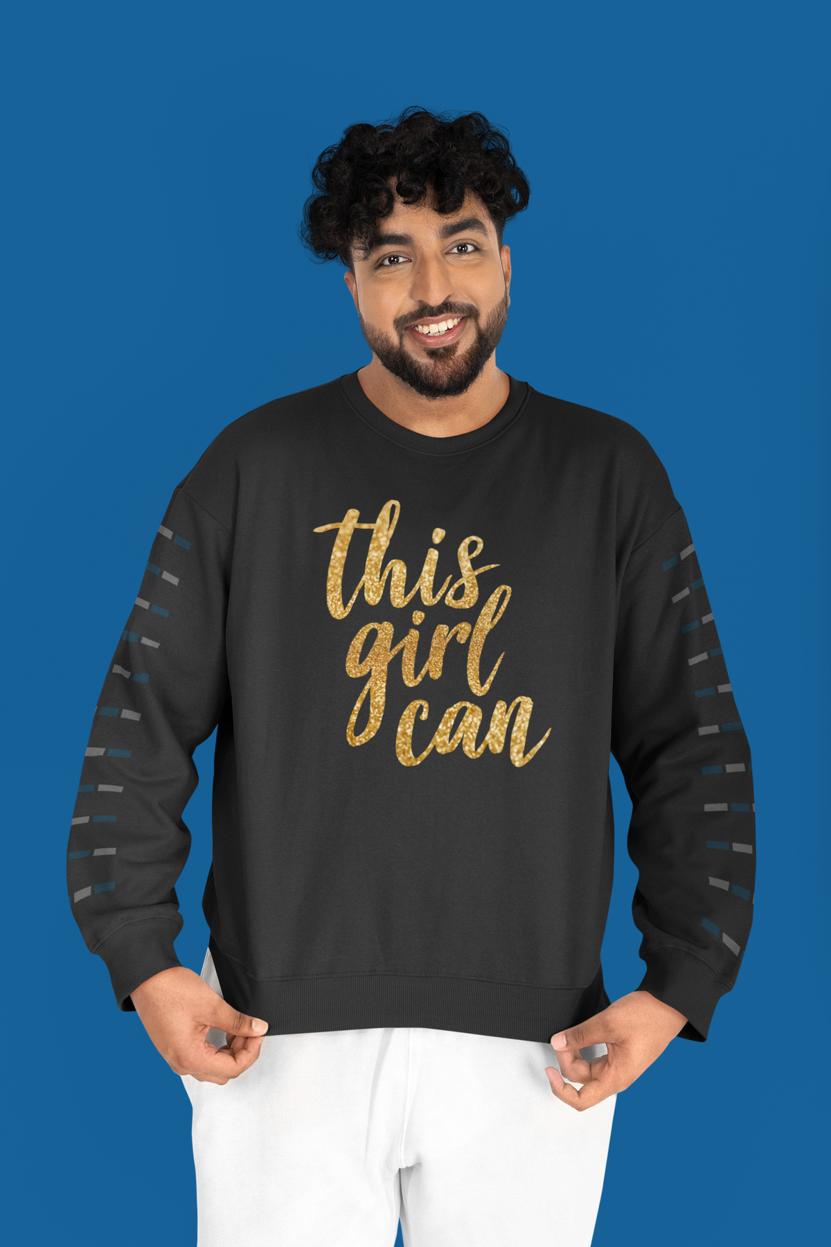 This Girl Can crewneck sweatshirt in black, man wearing it against a blue backdrop, motivational gift