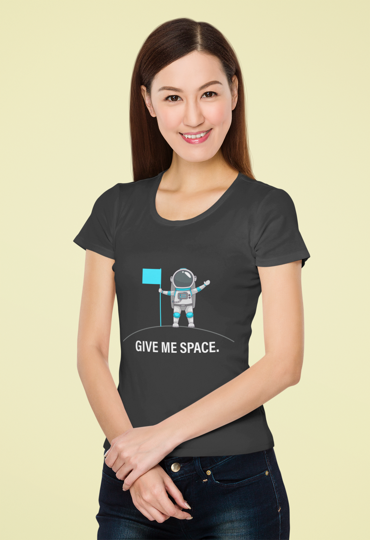 'Give Me Space' astronaut organic t-shirt in charcoal, woman wearing it in studio, funny space gift