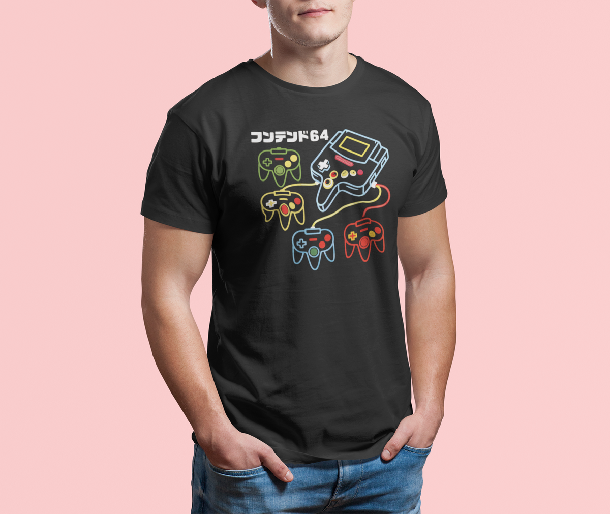 Retro game console oversized tee in black, man wearing it on pink background, funny gift for gamers
