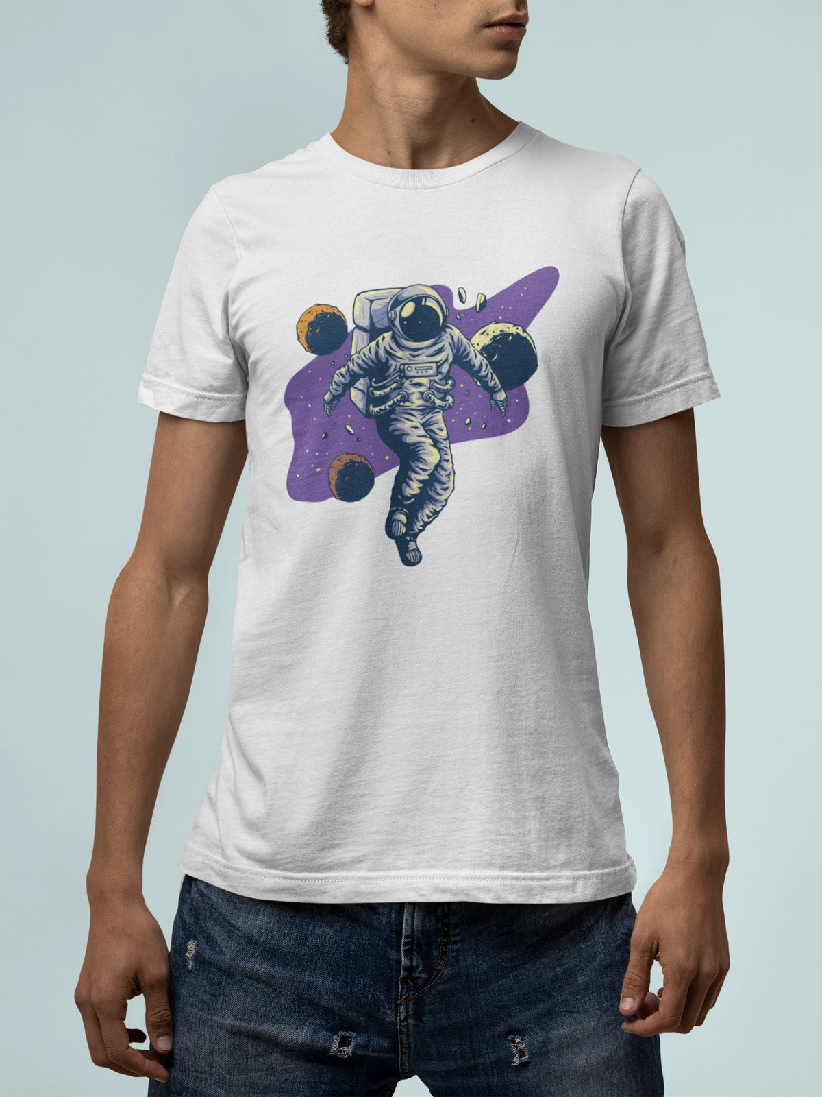 'Spacing Out' astronaut t-shirt in white, man wearing it outdoors, funny space shirt for men